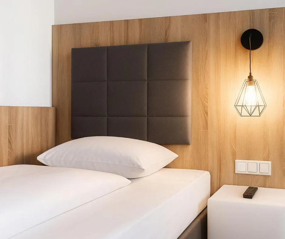 Bed in Plaza Hotel & Living Frankfurt