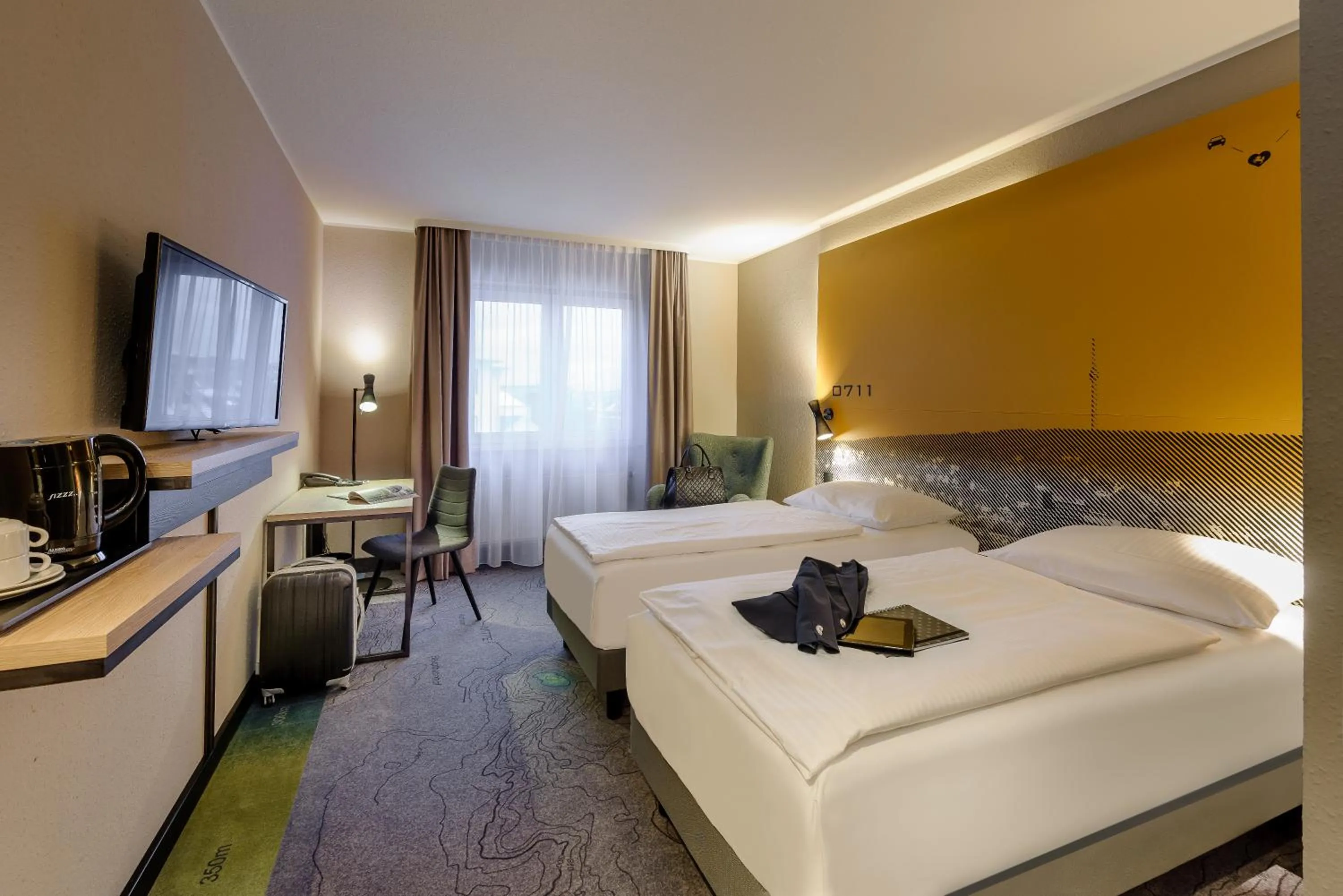 Photo of the whole room, Bed in Mercure Stuttgart Zuffenhausen