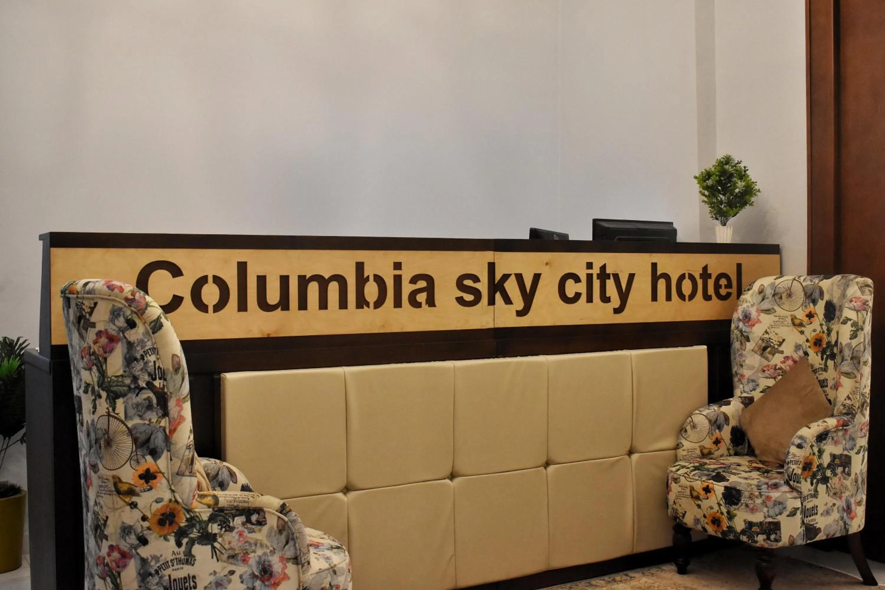 Property logo or sign in columbia sky city hotel