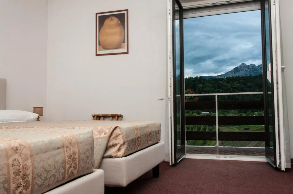 Bed in Hotel Dolomiti
