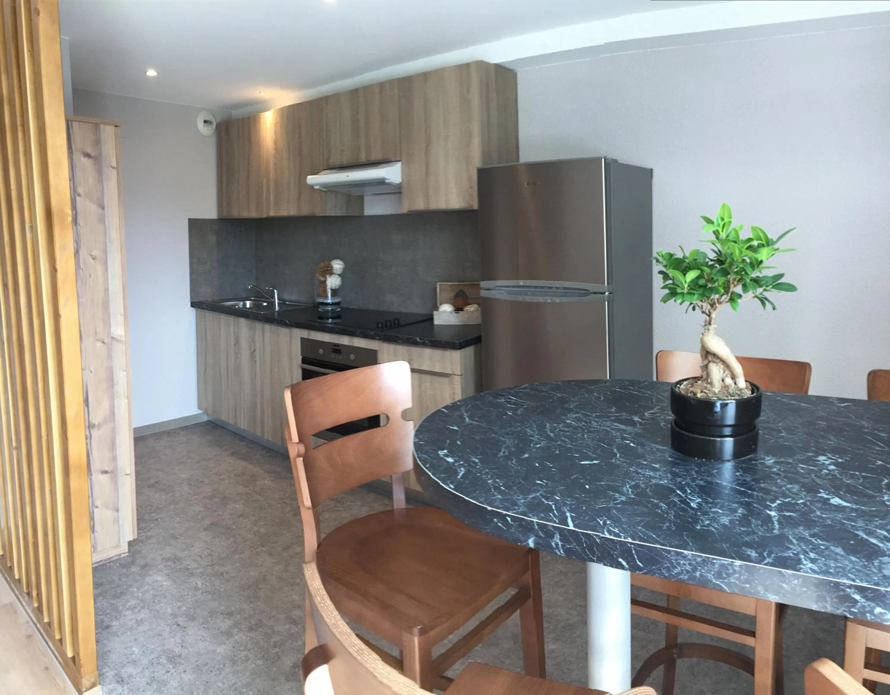 Dining area in Village Vacances Le Tarbesou - Pied de piste station Ax 3 Domaines