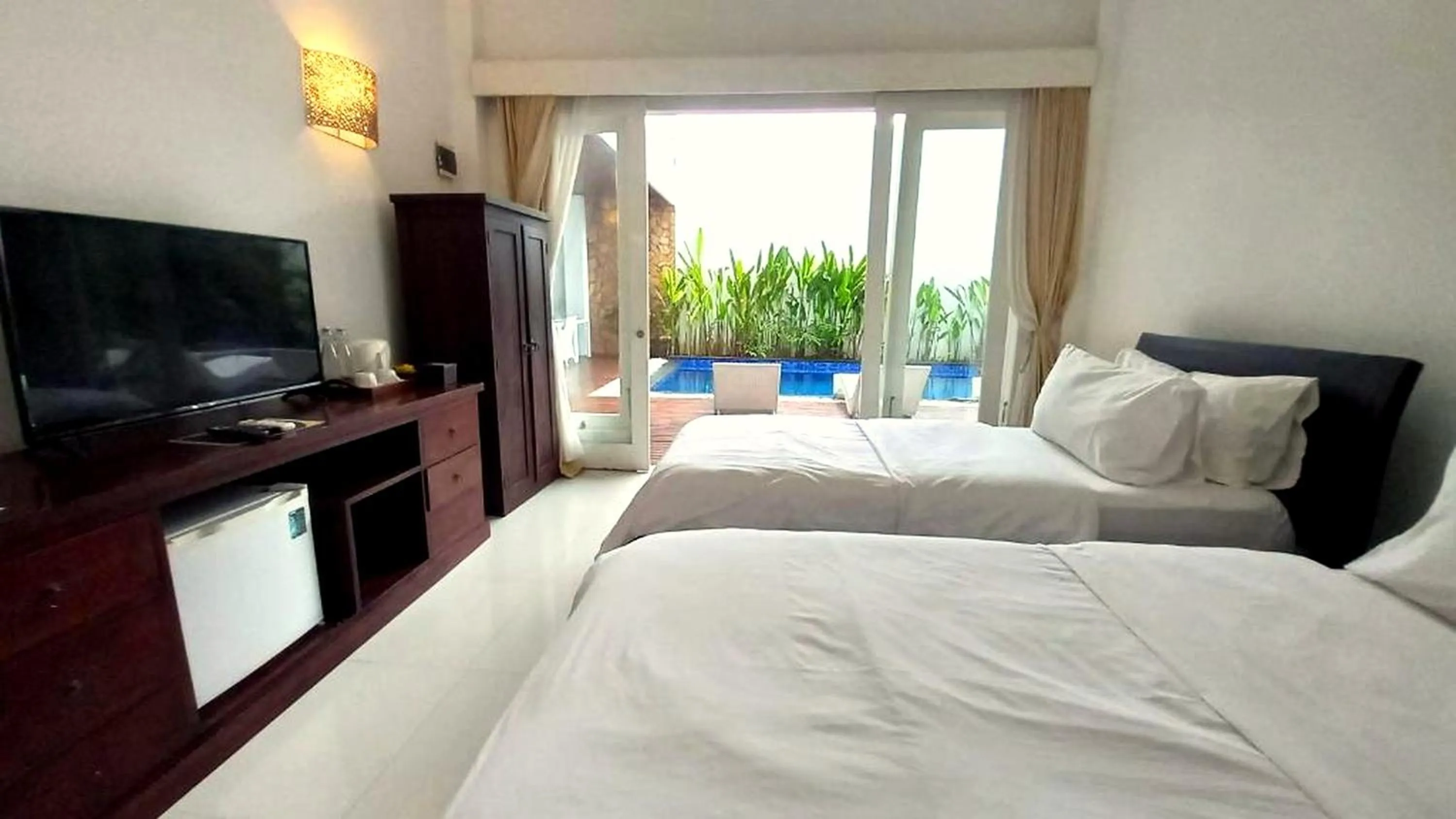 Bed in Lumiere Hotel Gili Trawangan