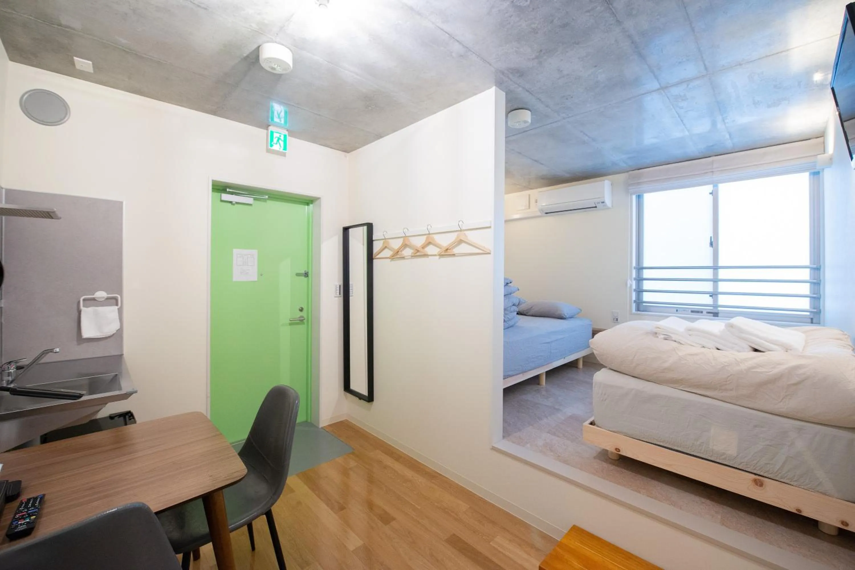 Photo of the whole room, Bed in bmj Hyakunincho