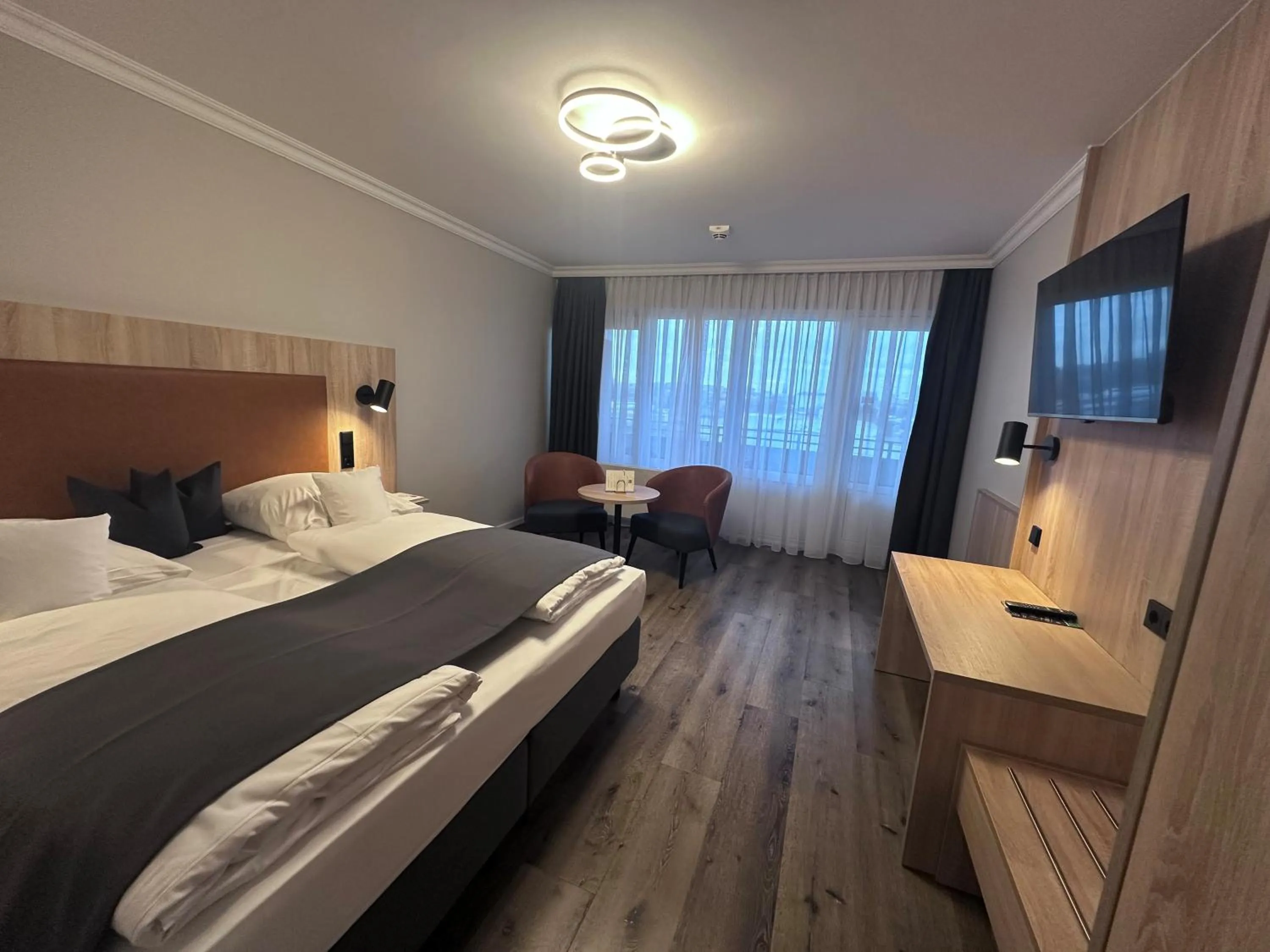 Living room, Bed in Apartment-Hotel Hamburg Mitte