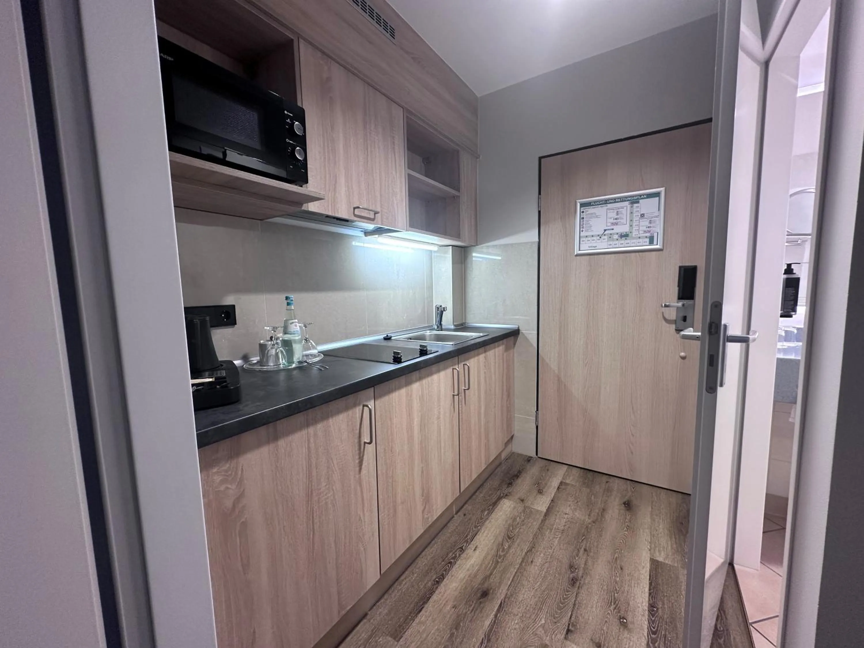 Kitchen or kitchenette in Apartment-Hotel Hamburg Mitte