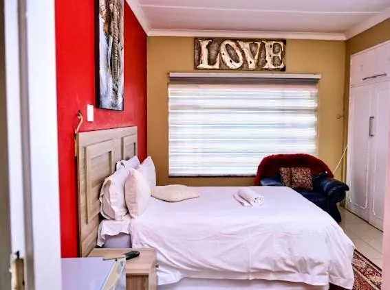 Bed in Lauren Palace Guest House