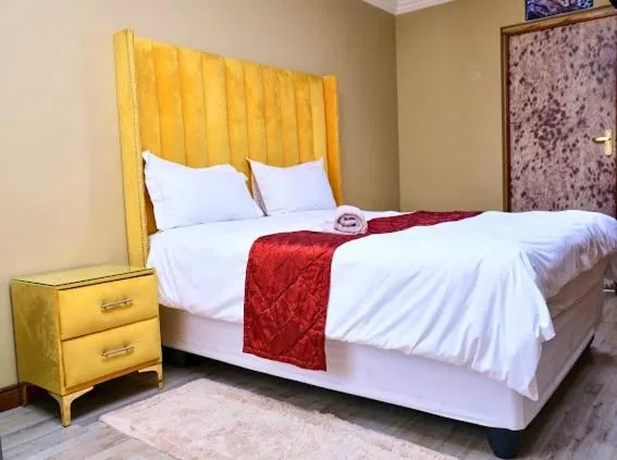 Bed in Lauren Palace Guest House