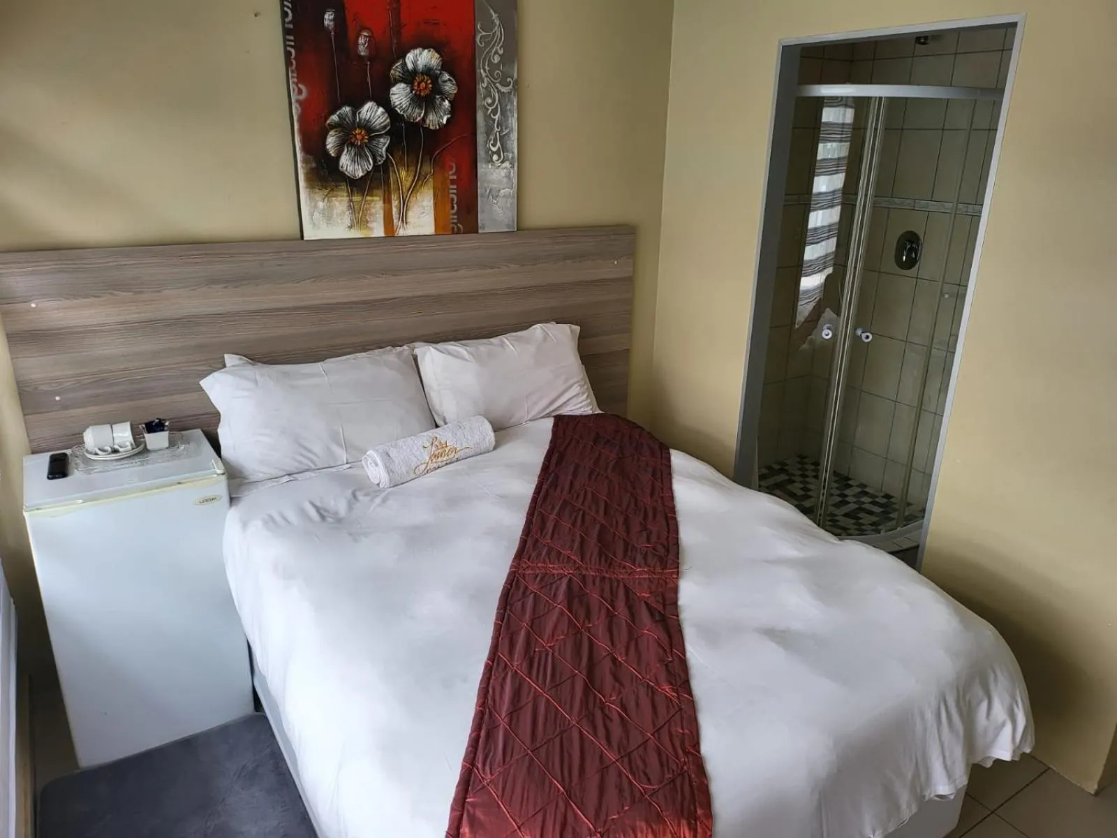 Bed in Lauren Palace Guest House