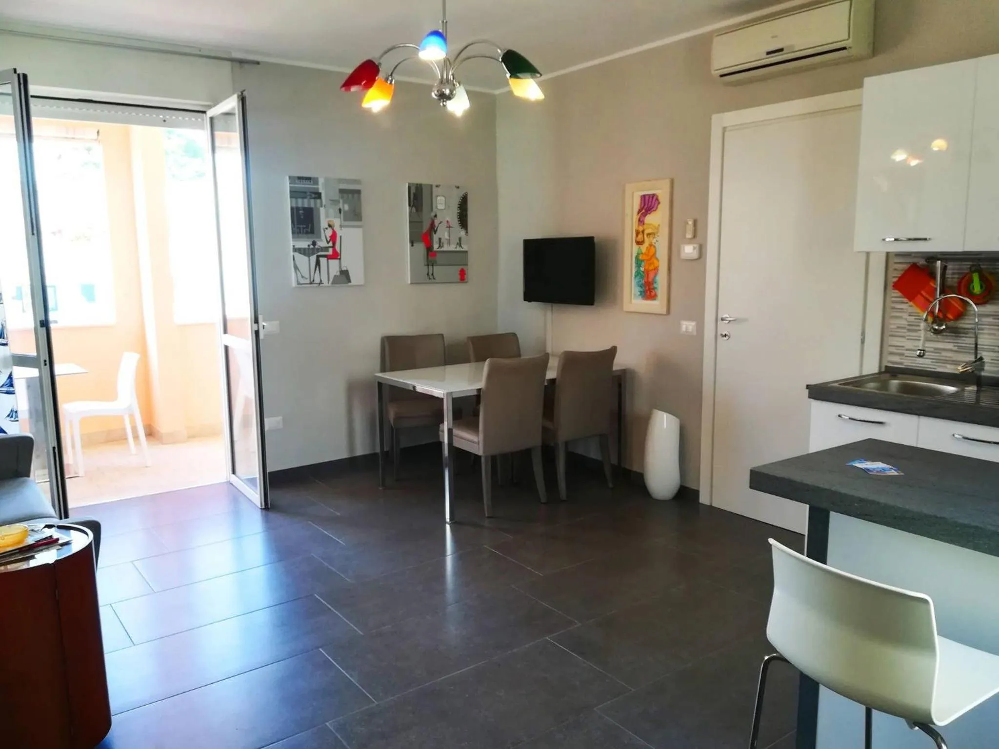 Seating area in Modern Holiday Apartment With Wi-fi, Air Conditioning And Balcony; Pets Allowed