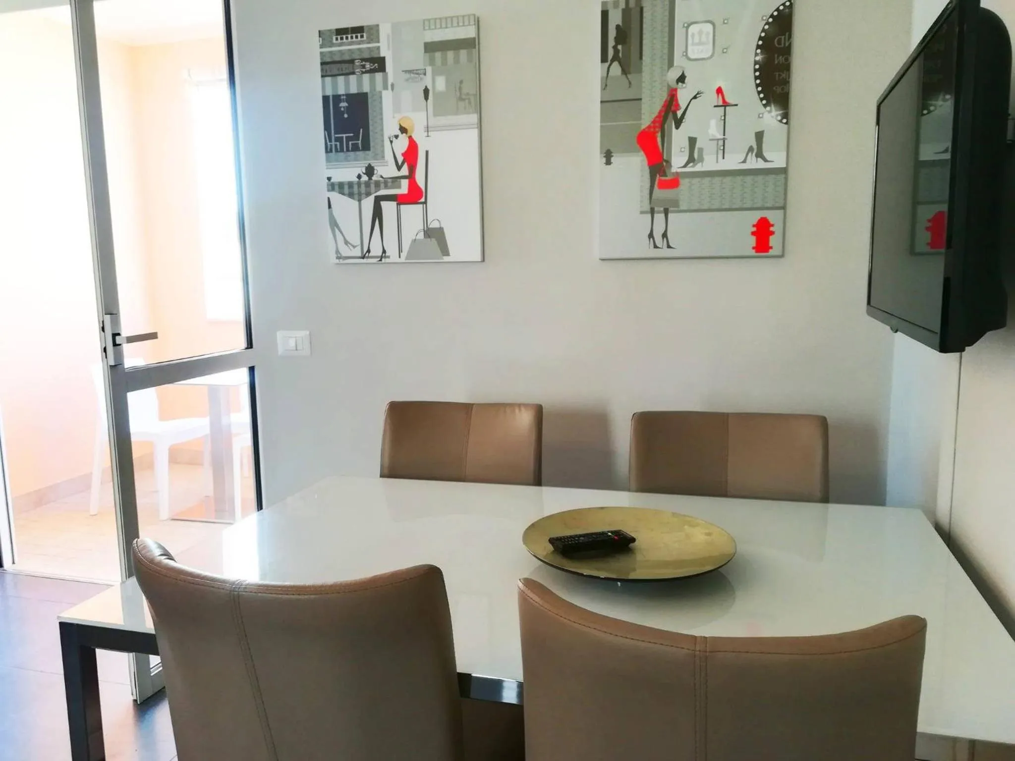 Dining area in Modern Holiday Apartment With Wi-fi, Air Conditioning And Balcony; Pets Allowed