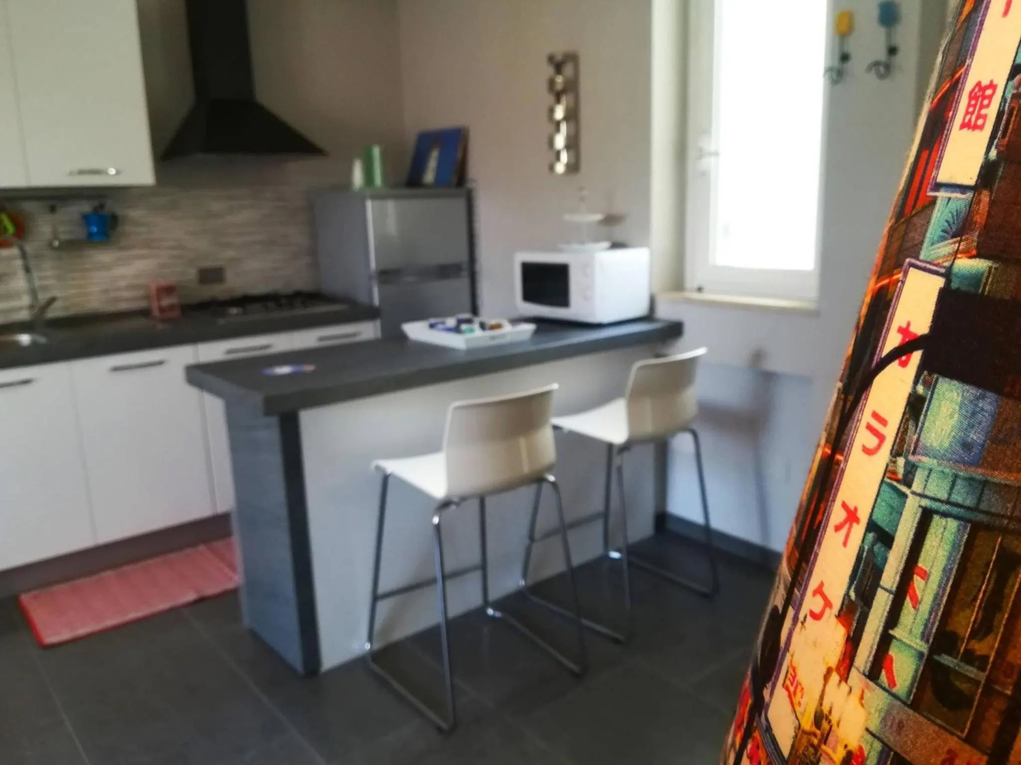 kitchen in Modern Holiday Apartment With Wi-fi, Air Conditioning And Balcony; Pets Allowed