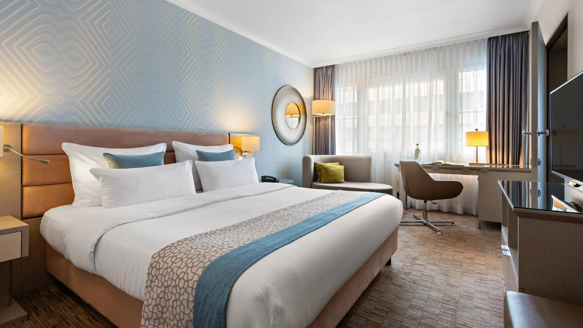 Photo of the whole room, Bed in Crowne Plaza Berlin City Centre Ku'damm by IHG