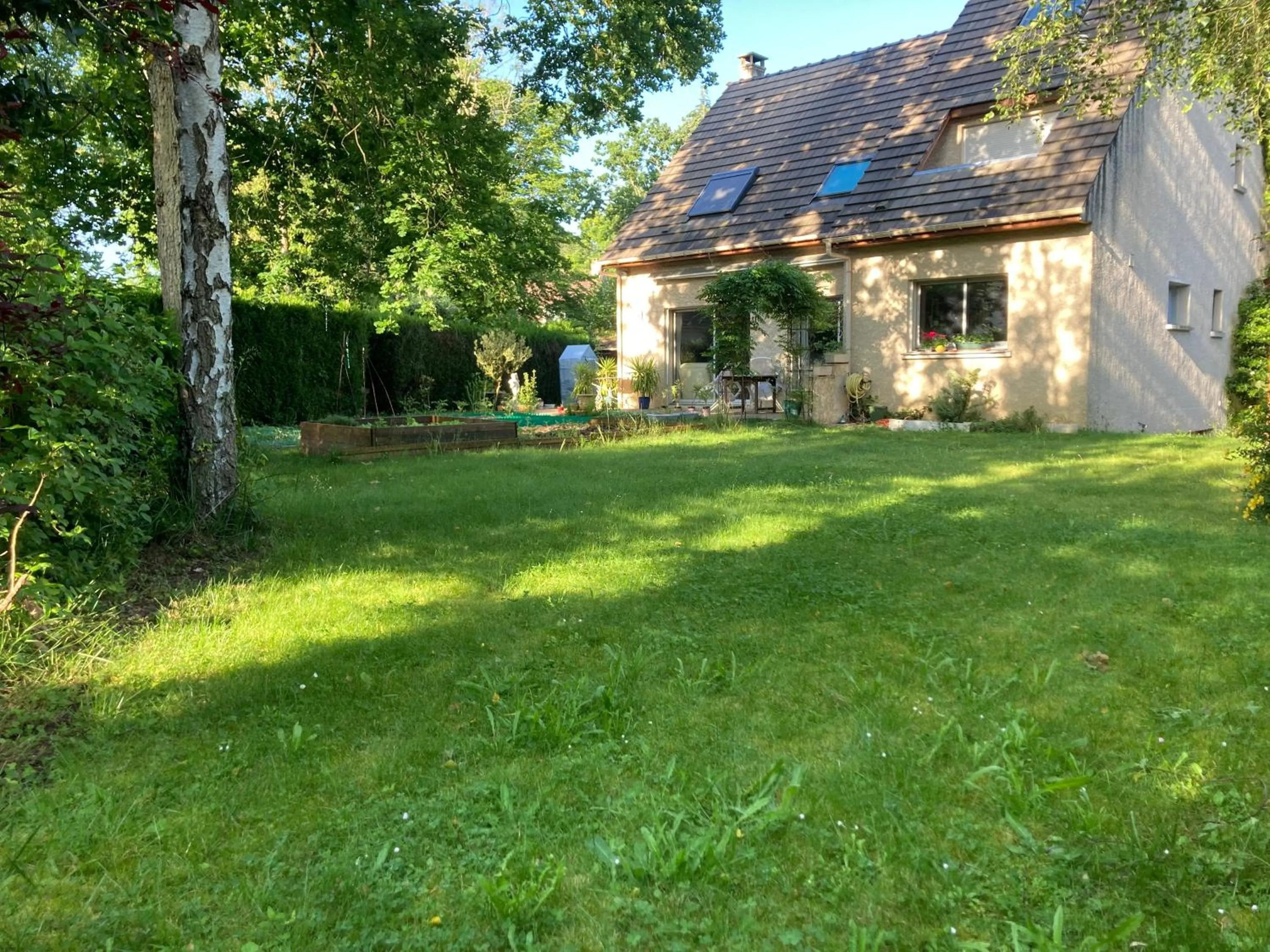 Garden in Maison Chevreuse, chambre chez l'habitant
