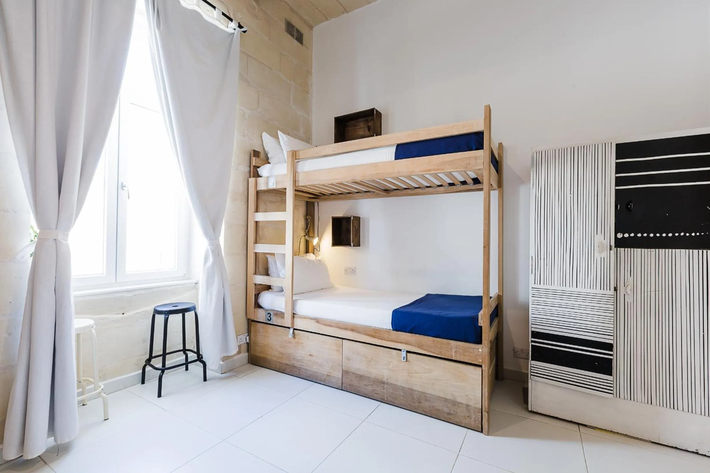 Bed in Two Pillows Boutique Hostel