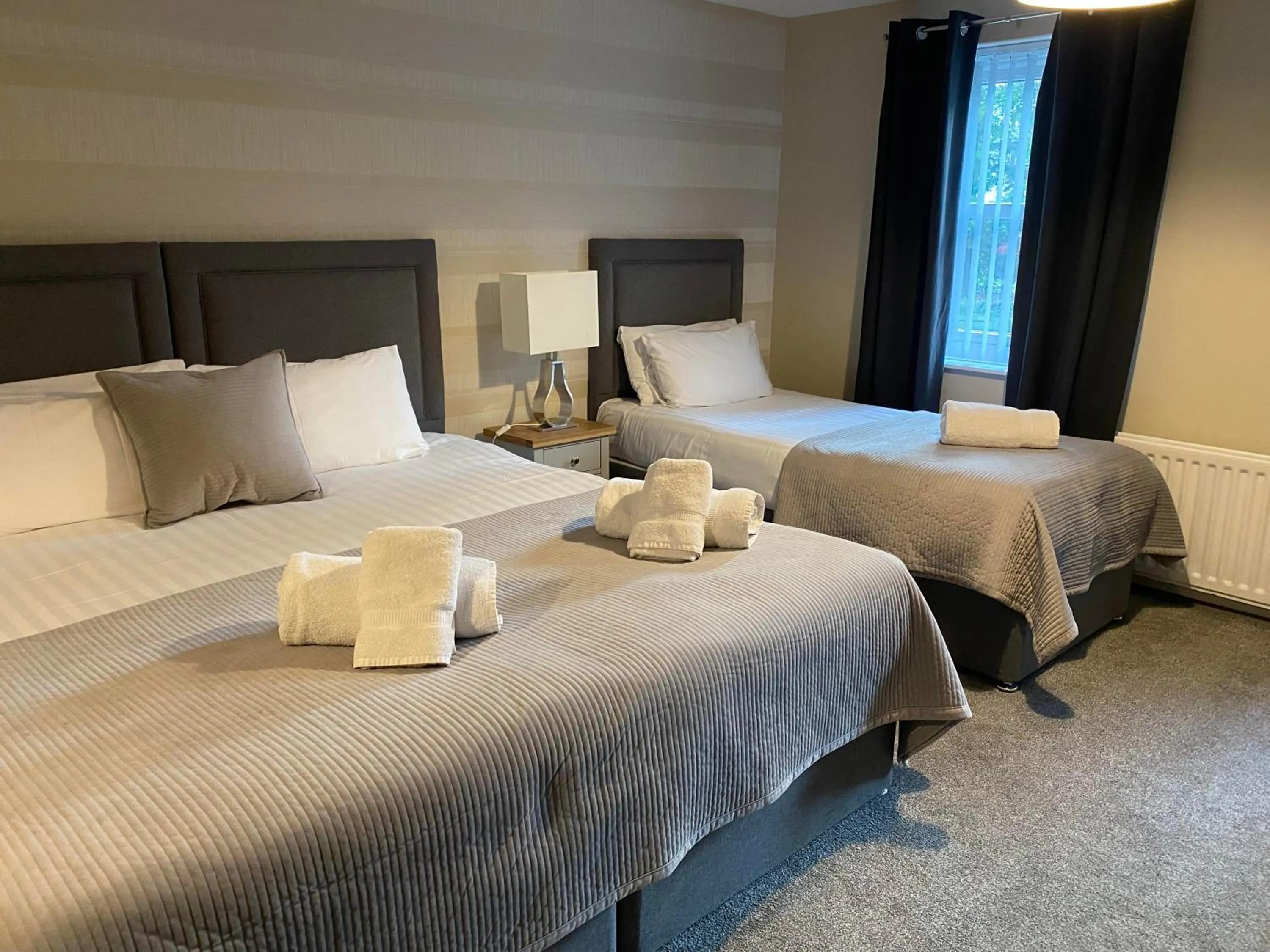 Bed in The Oaks Hotel