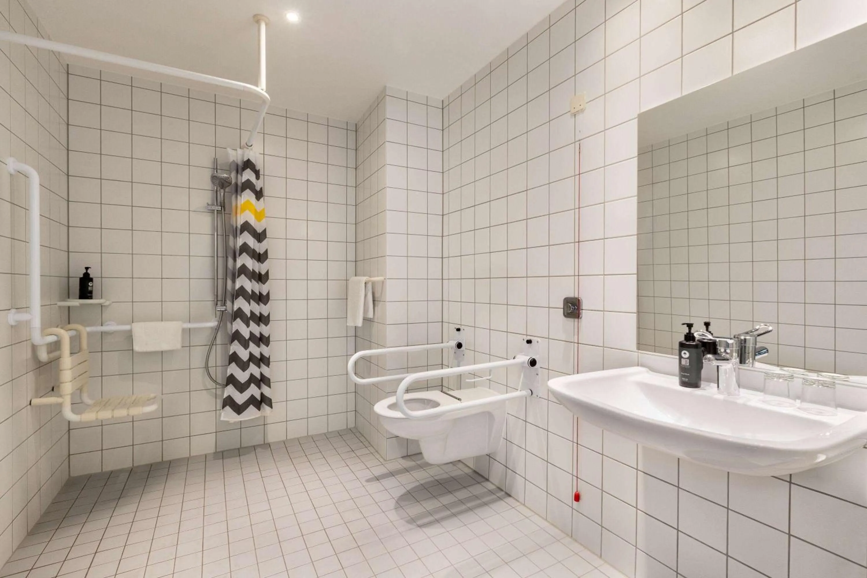 Shower in Vienna House Easy by Wyndham Amberg