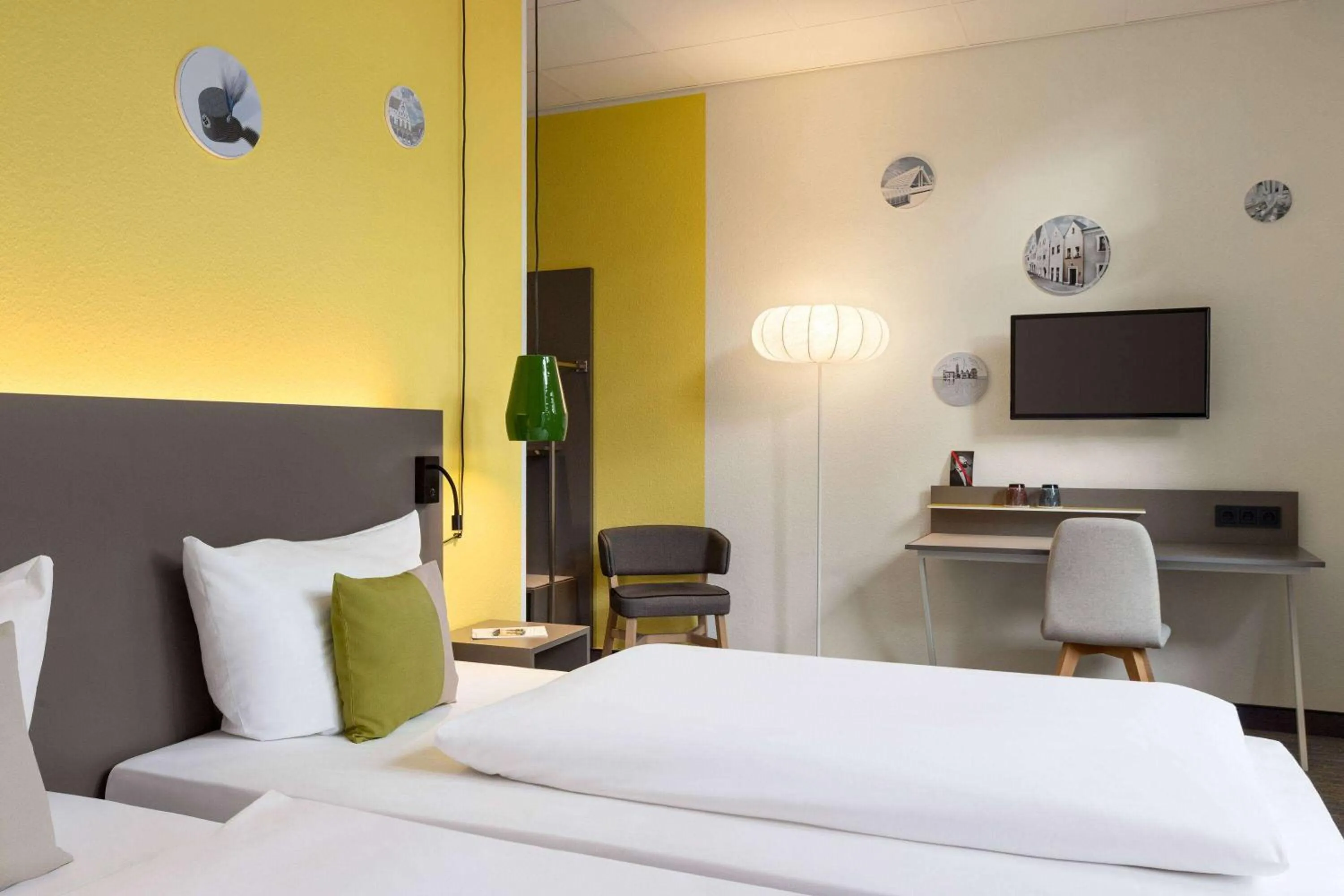 Photo of the whole room, Bed in Vienna House Easy by Wyndham Amberg