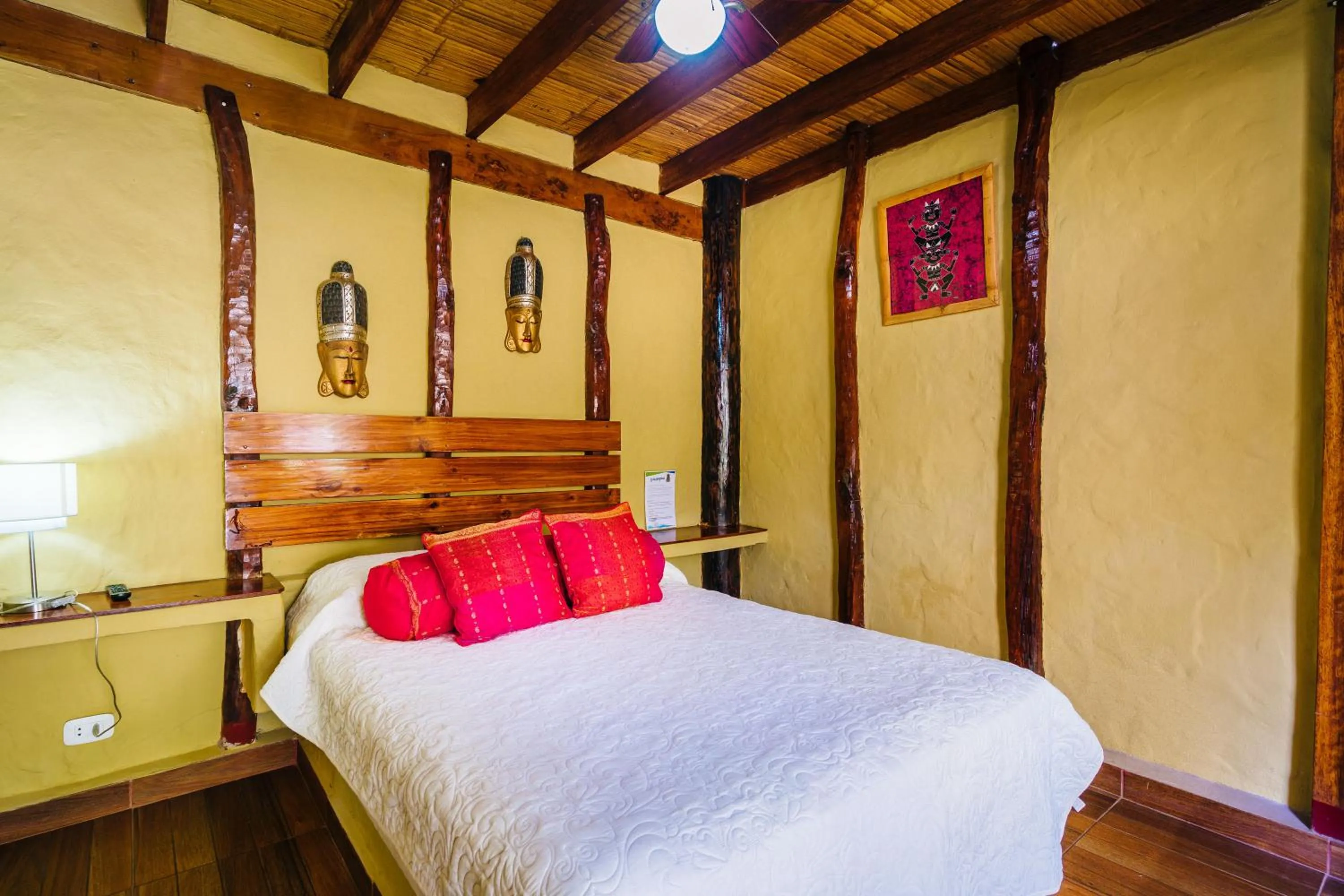 Bed in Kimbas Bungalows Mancora