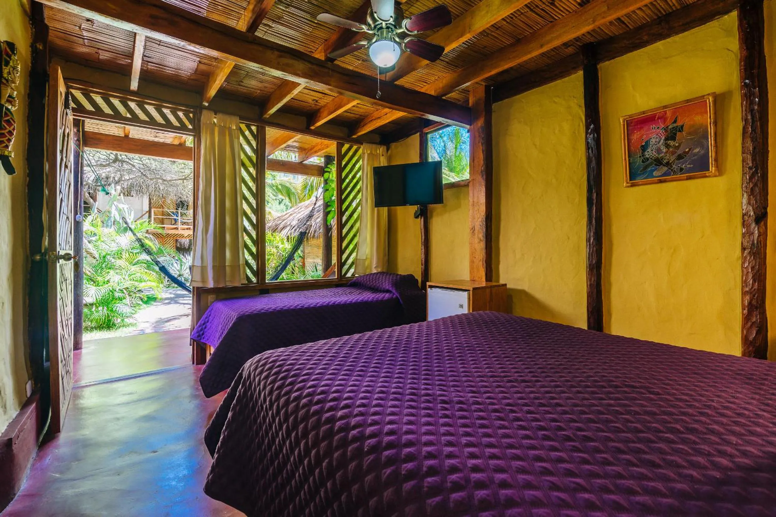 Bed in Kimbas Bungalows Mancora