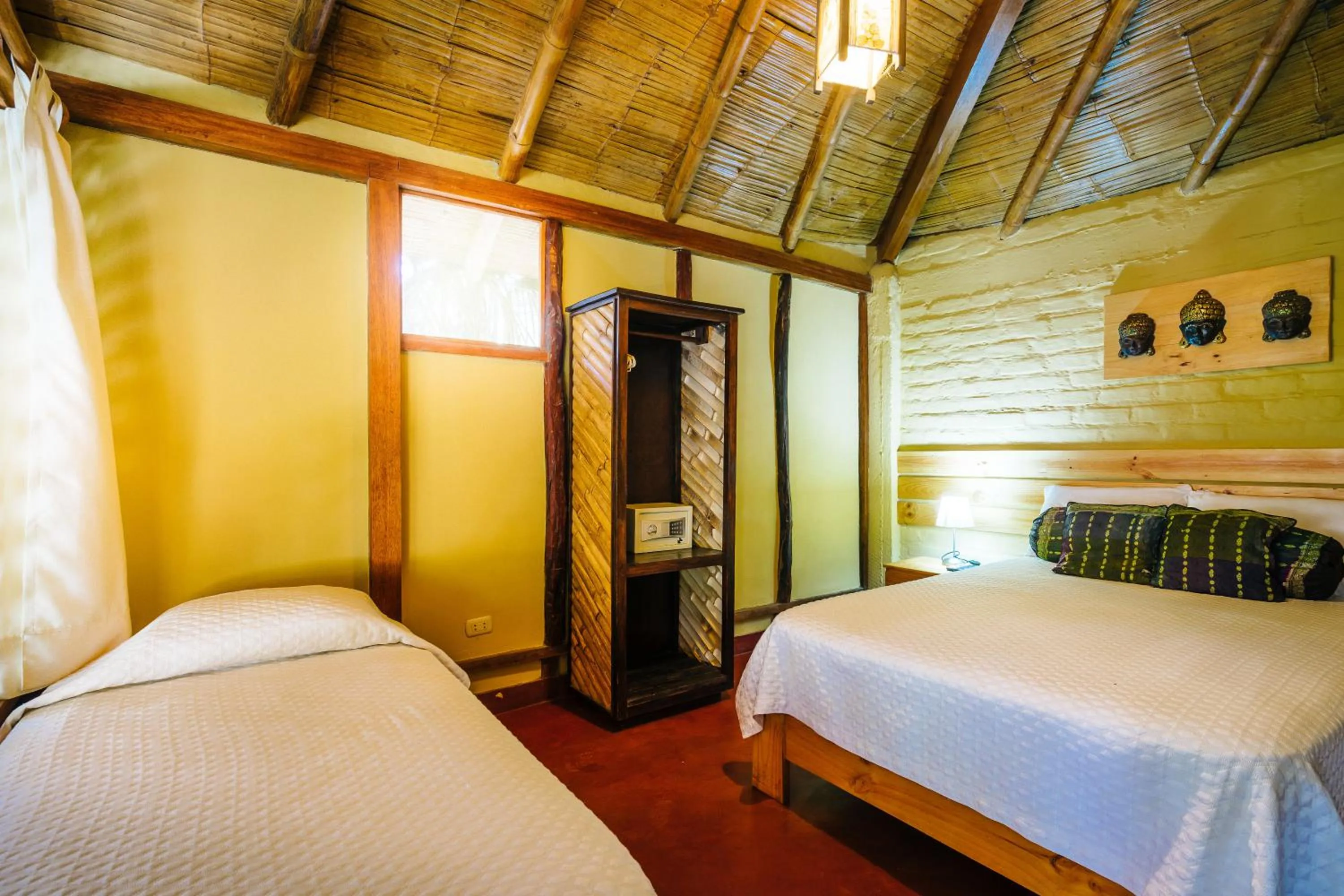 Bed in Kimbas Bungalows Mancora