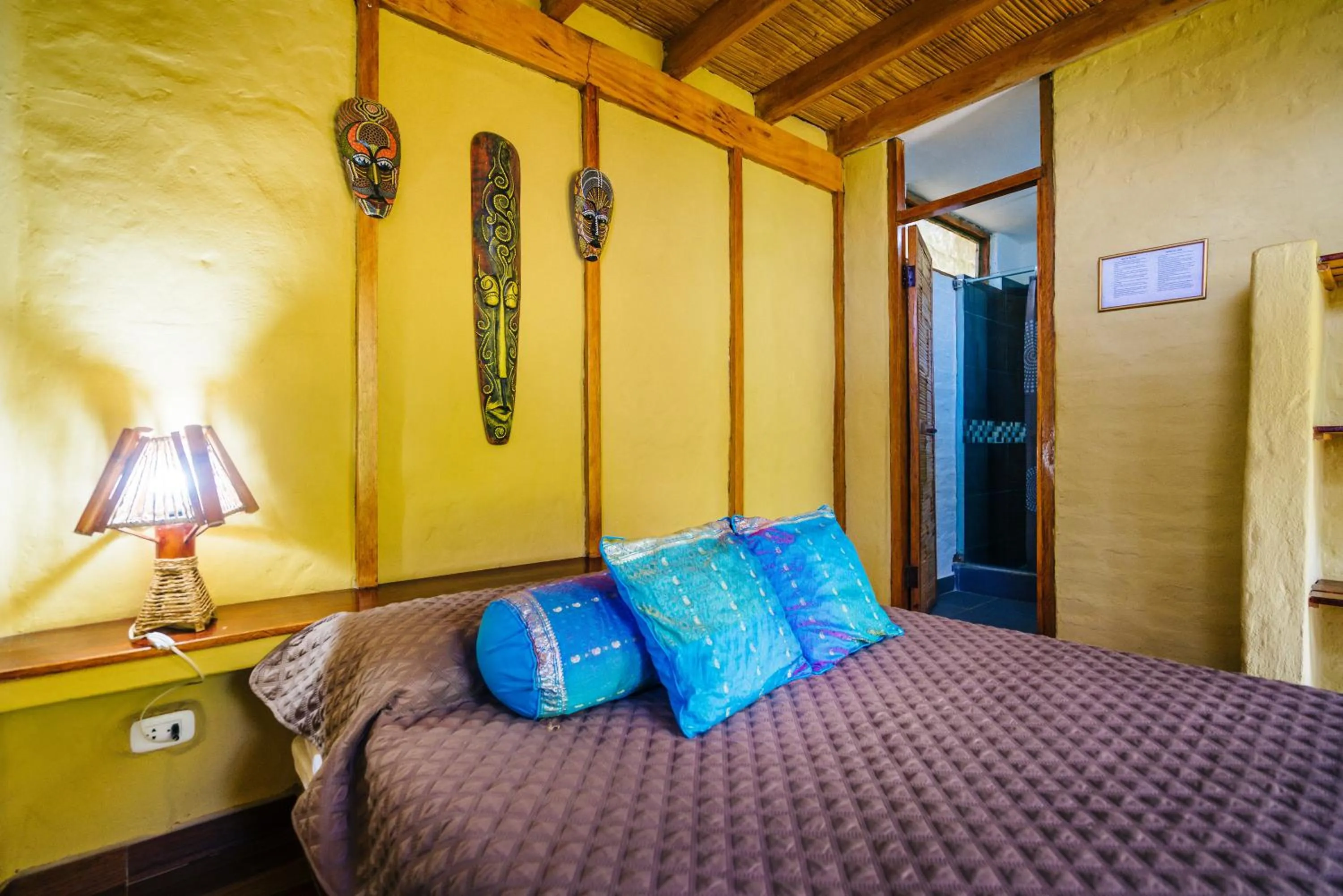 Bed in Kimbas Bungalows Mancora