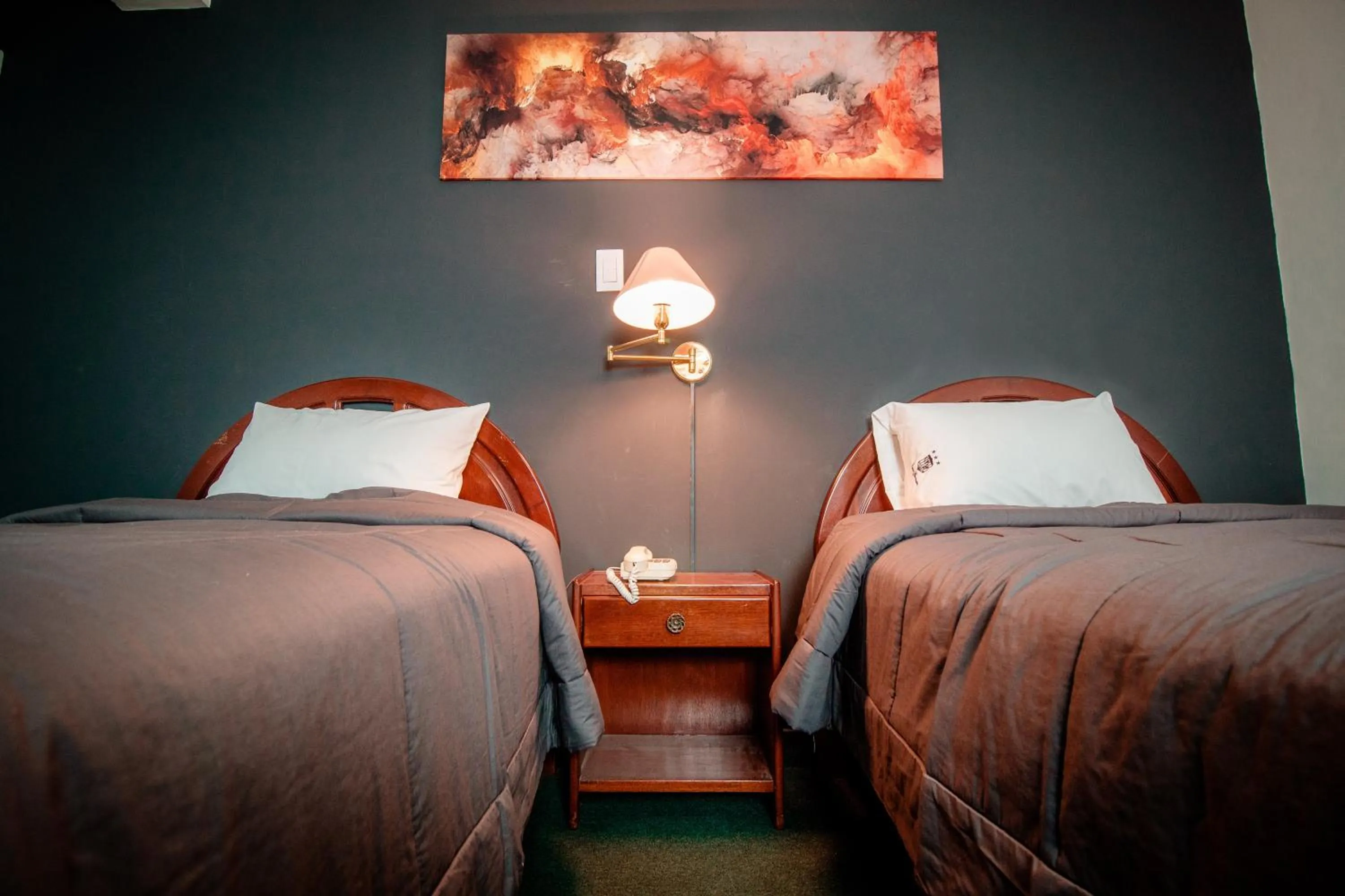 Bed in Saint Germain Hotel