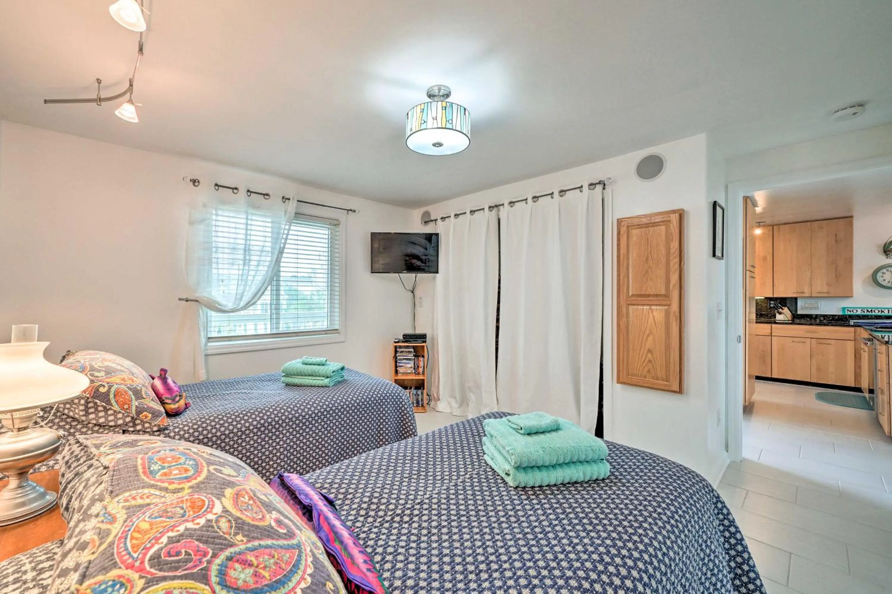 Bed in Ocean Dunes Kure Beach Condo with Balcony and Pool