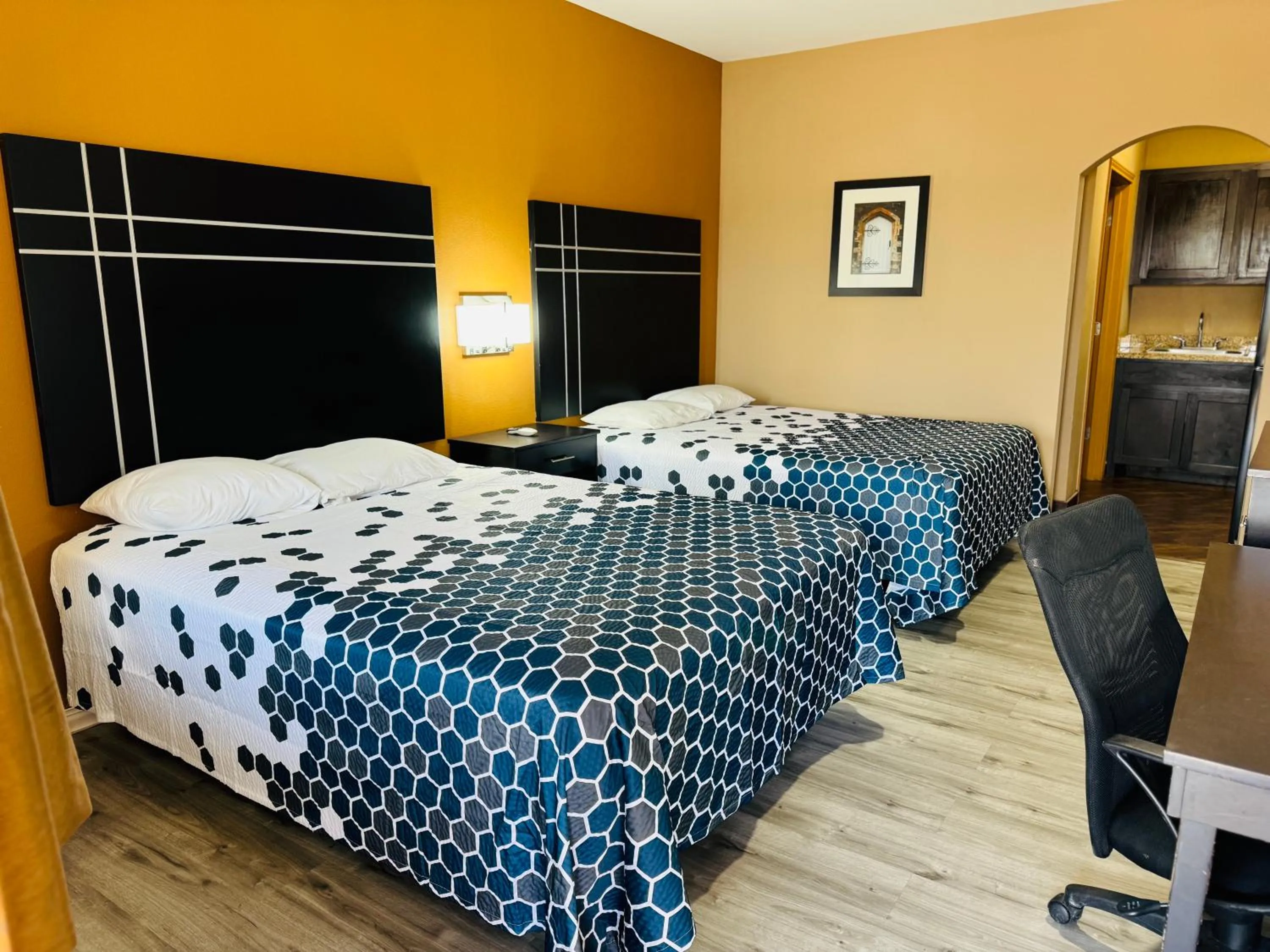 Bed in Executive Inn & Suites