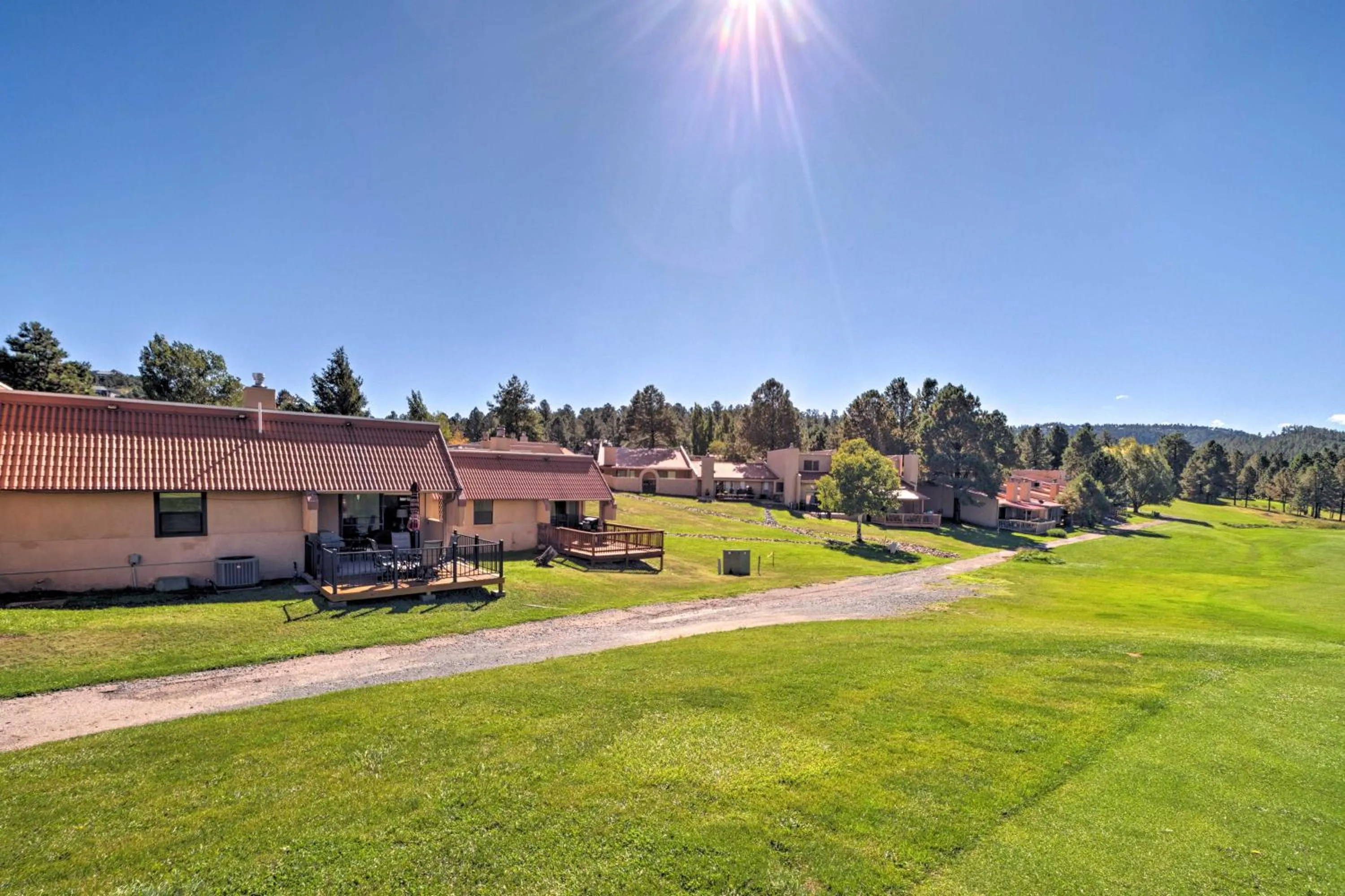 Bright Ruidoso Condo with Deck and Golf Course Views!