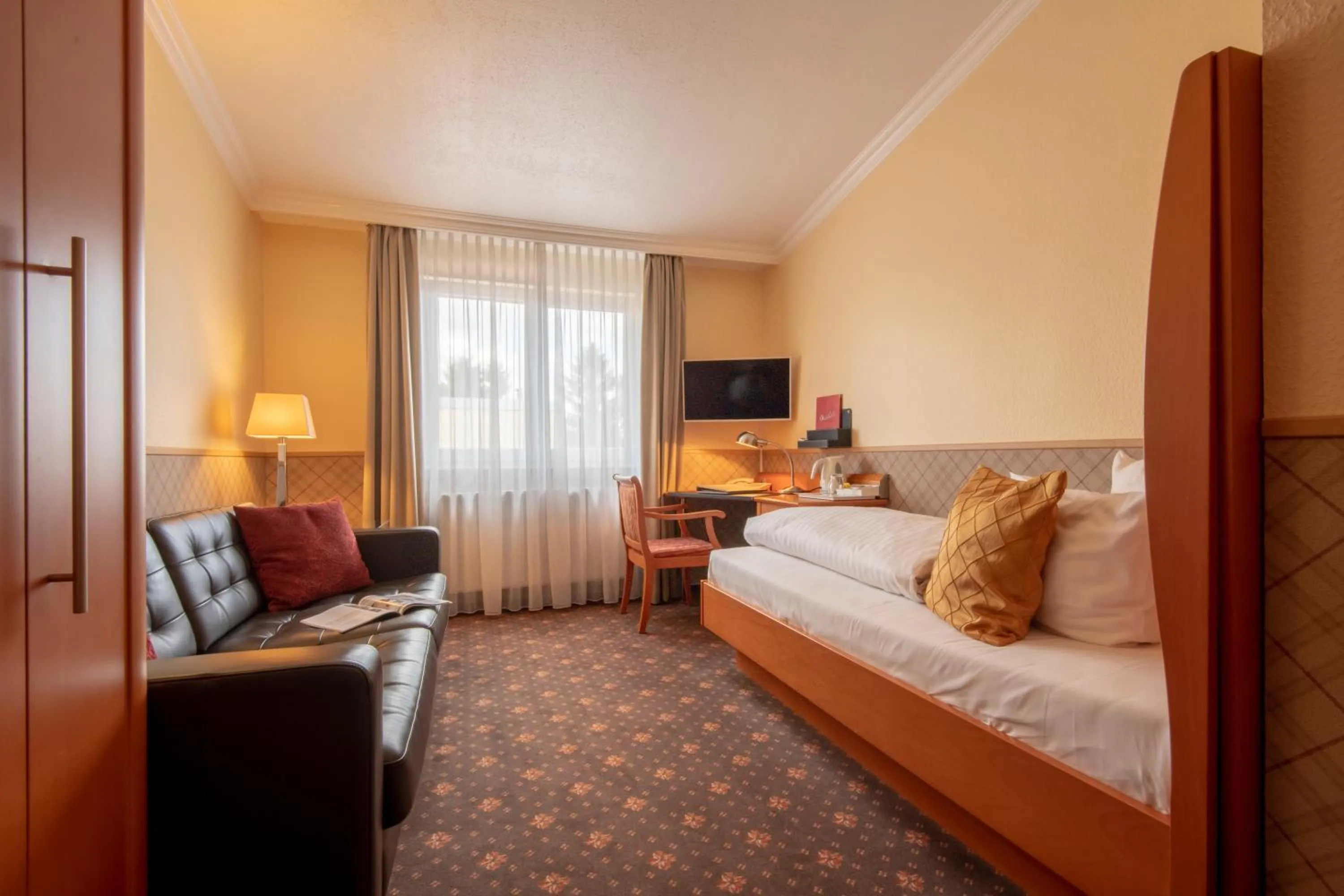 Bed in Hotel Wegner - T h e culinary art hotel