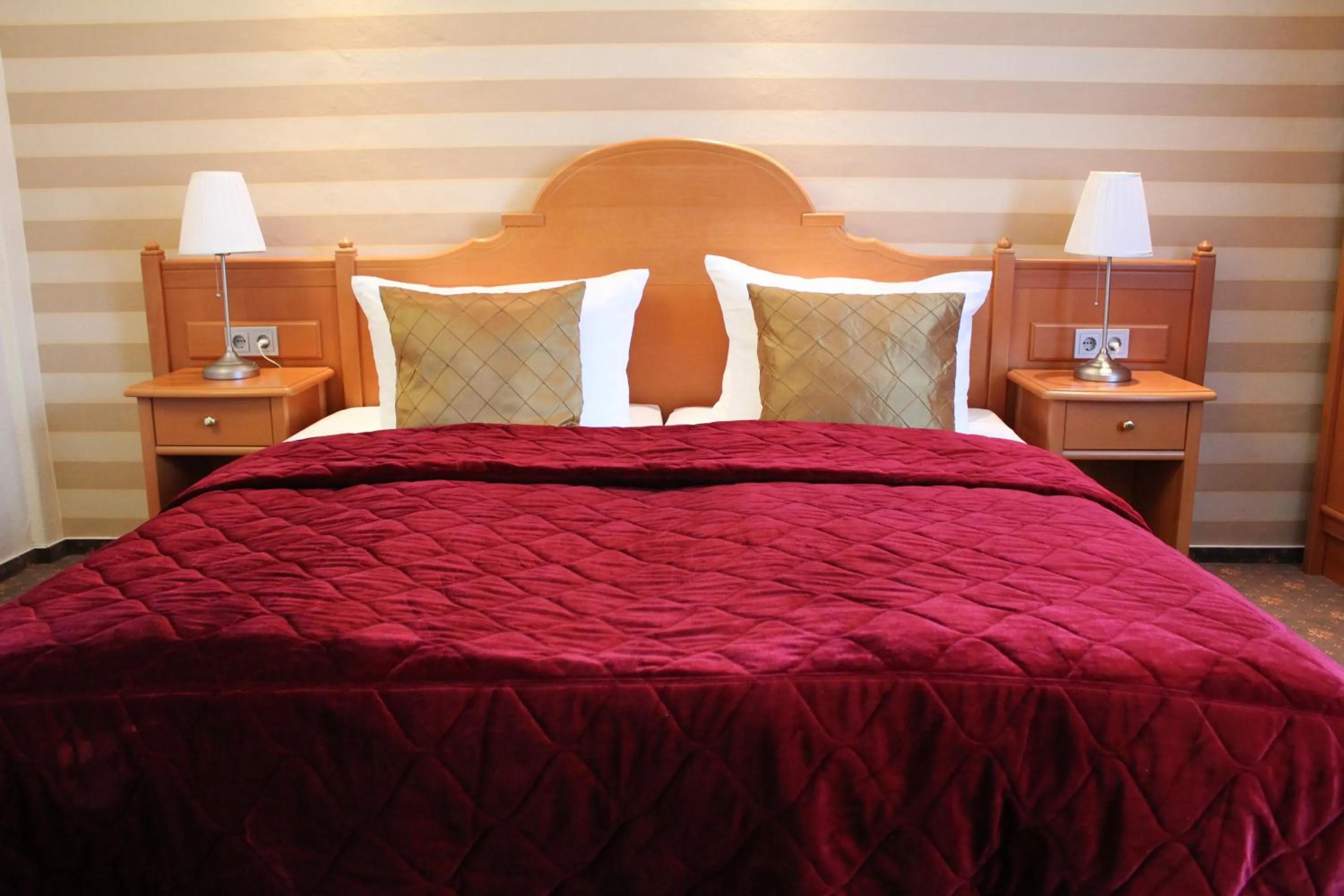 Bed in Hotel Wegner - T h e culinary art hotel