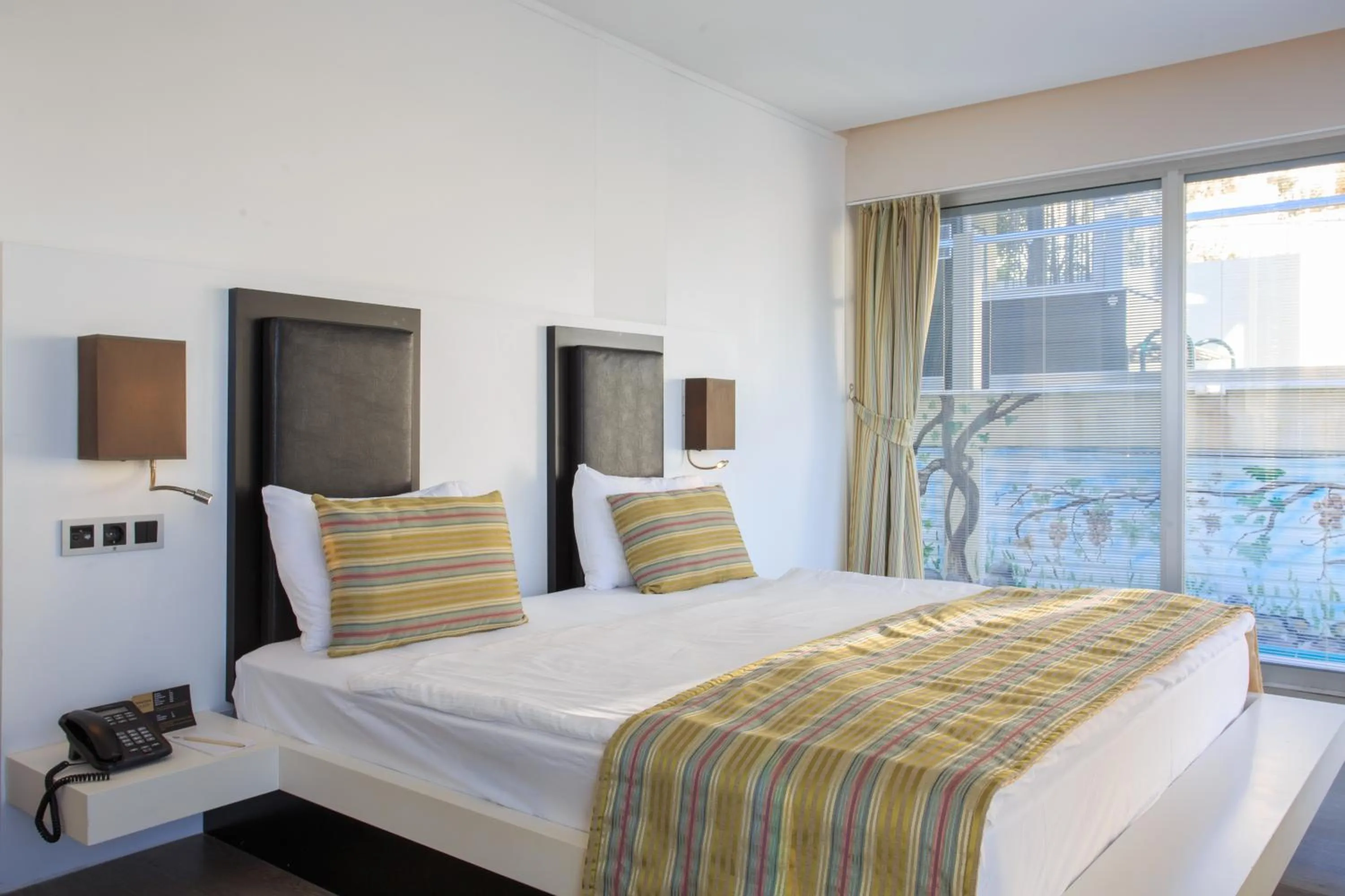 Bed in Orka Sunlife Resort Hotel and Aquapark