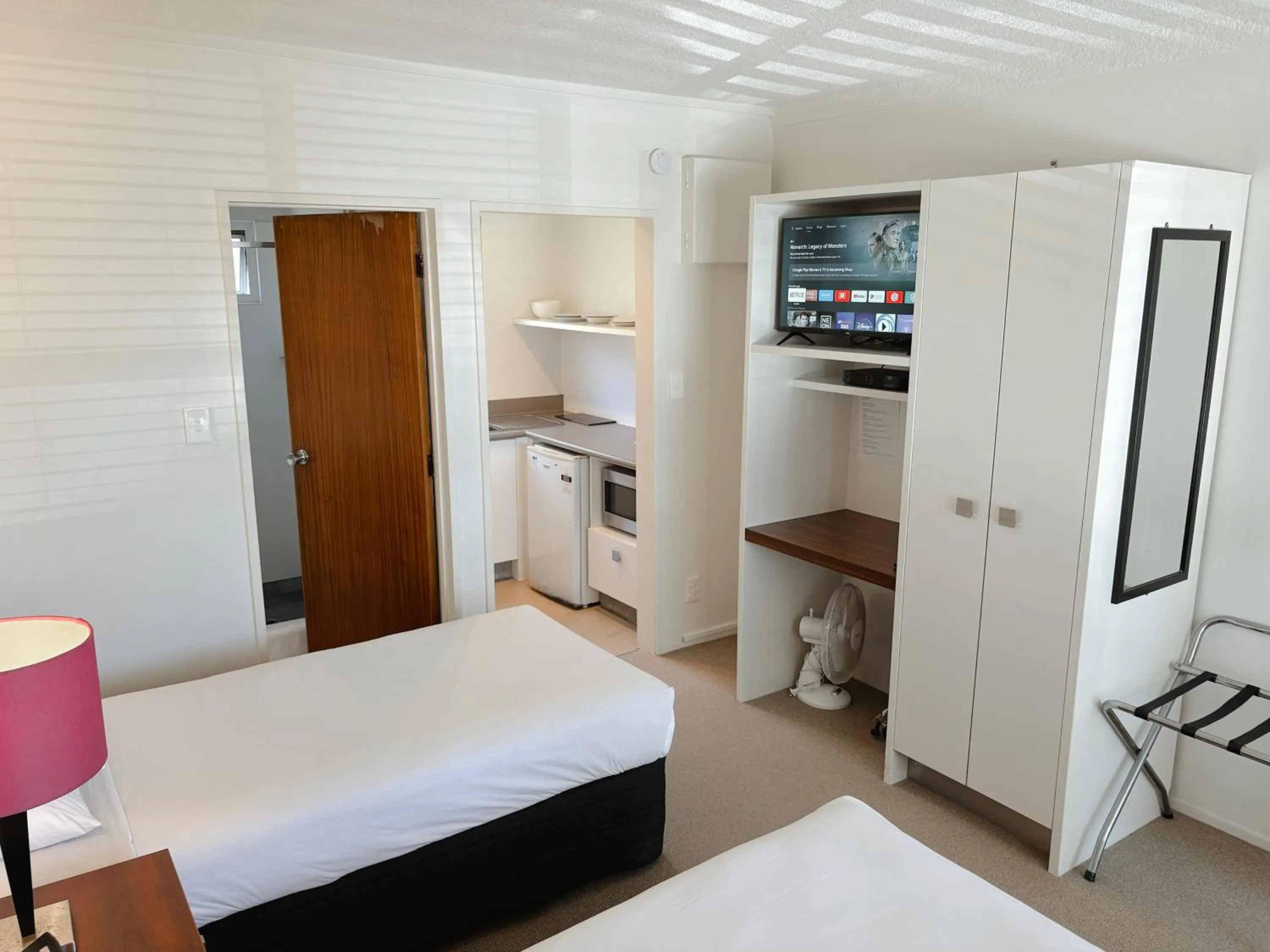 Bed in Mt Albert Motor Lodge