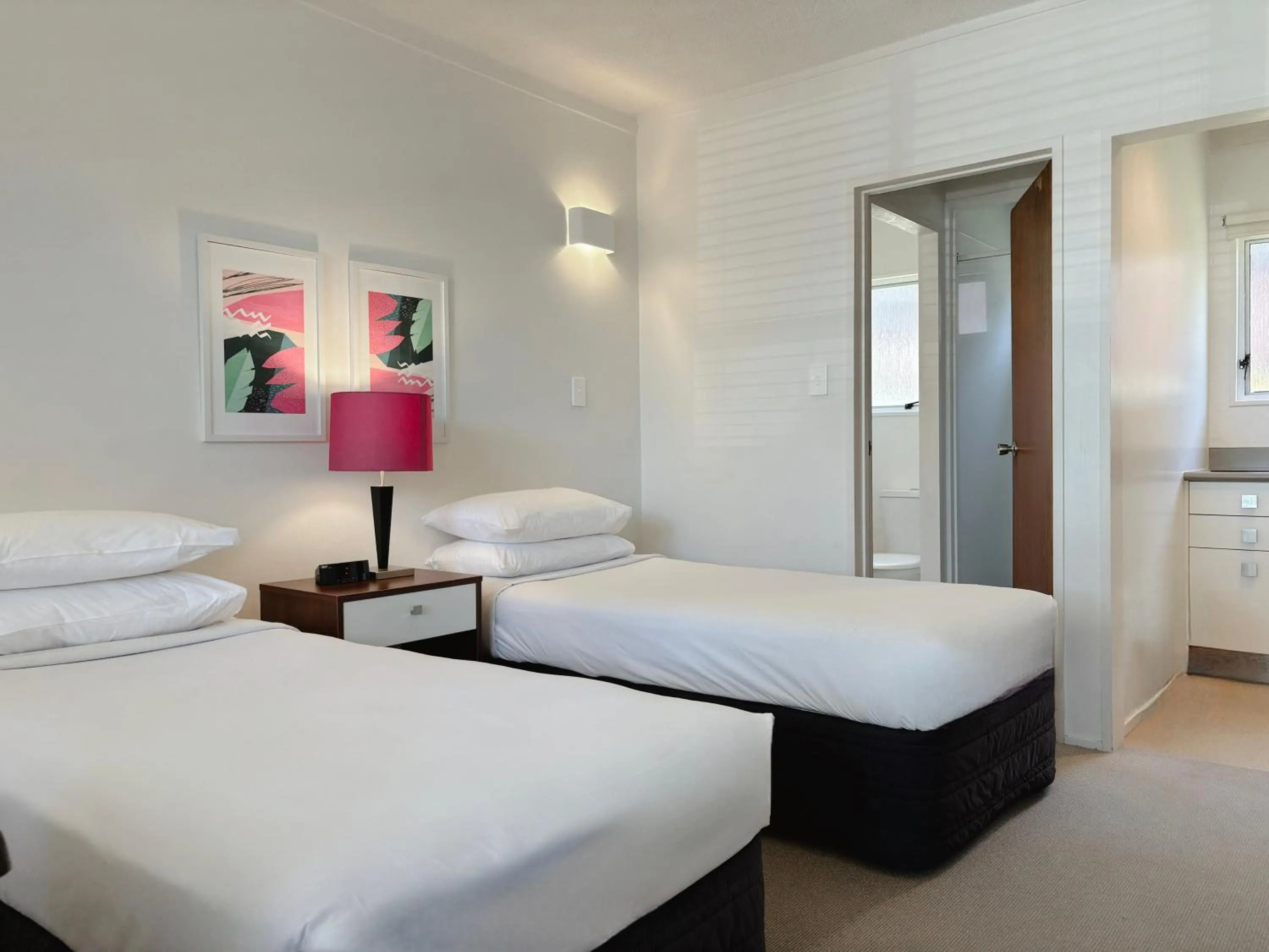 Bed in Mt Albert Motor Lodge