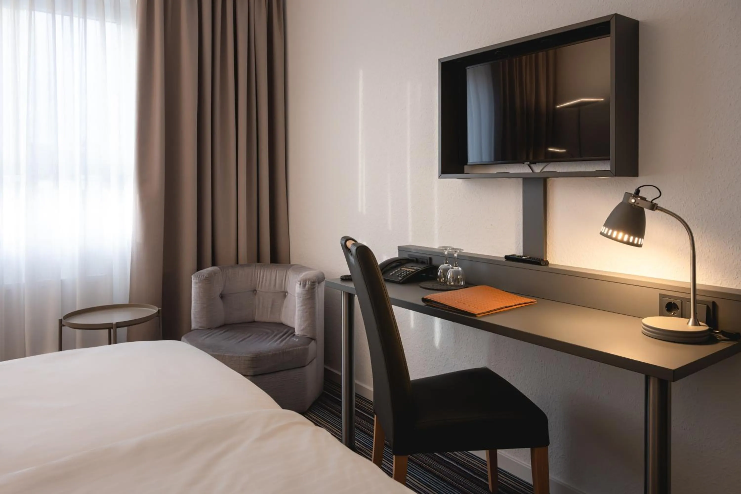 Seating area, Bed in Hotel Astra