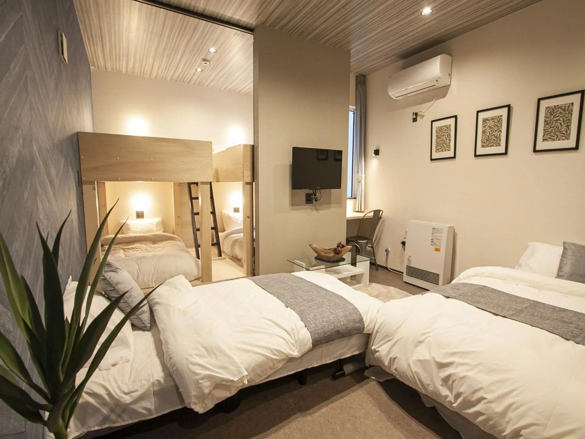 Bed in UCHI SUSUKINO WEST by Hotel Wheat