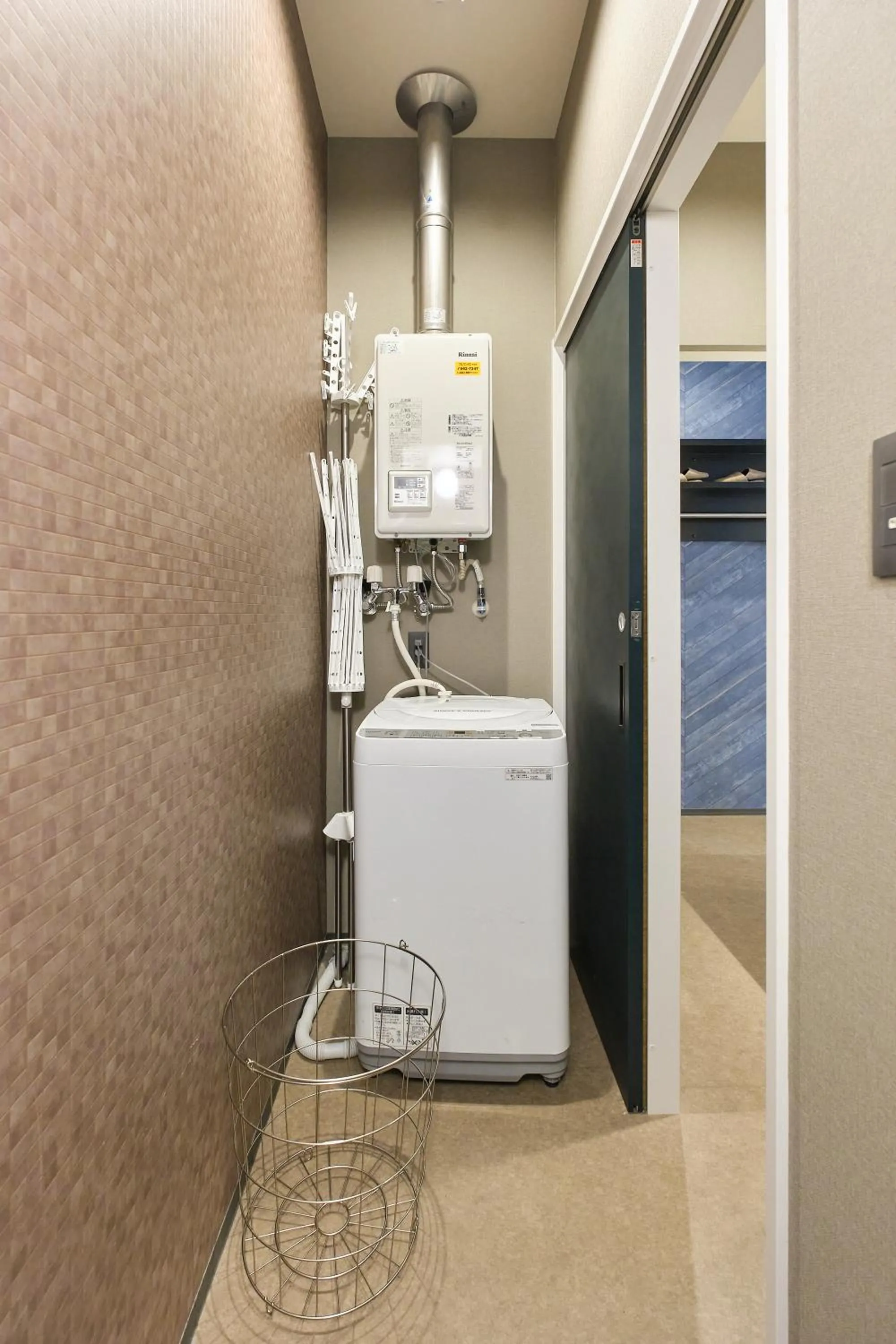 laundry in UCHI SUSUKINO WEST by Hotel Wheat