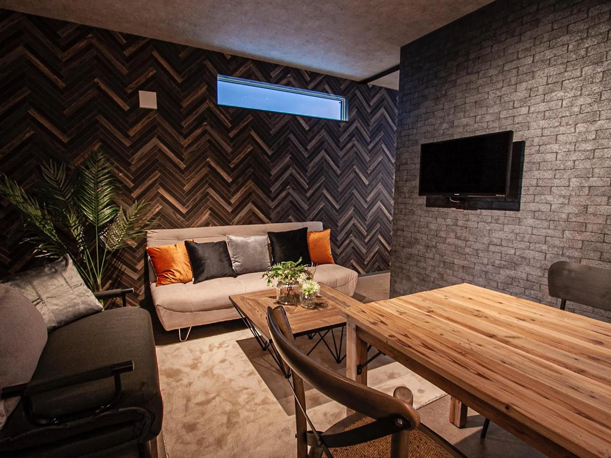 Living room in UCHI SUSUKINO WEST by Hotel Wheat