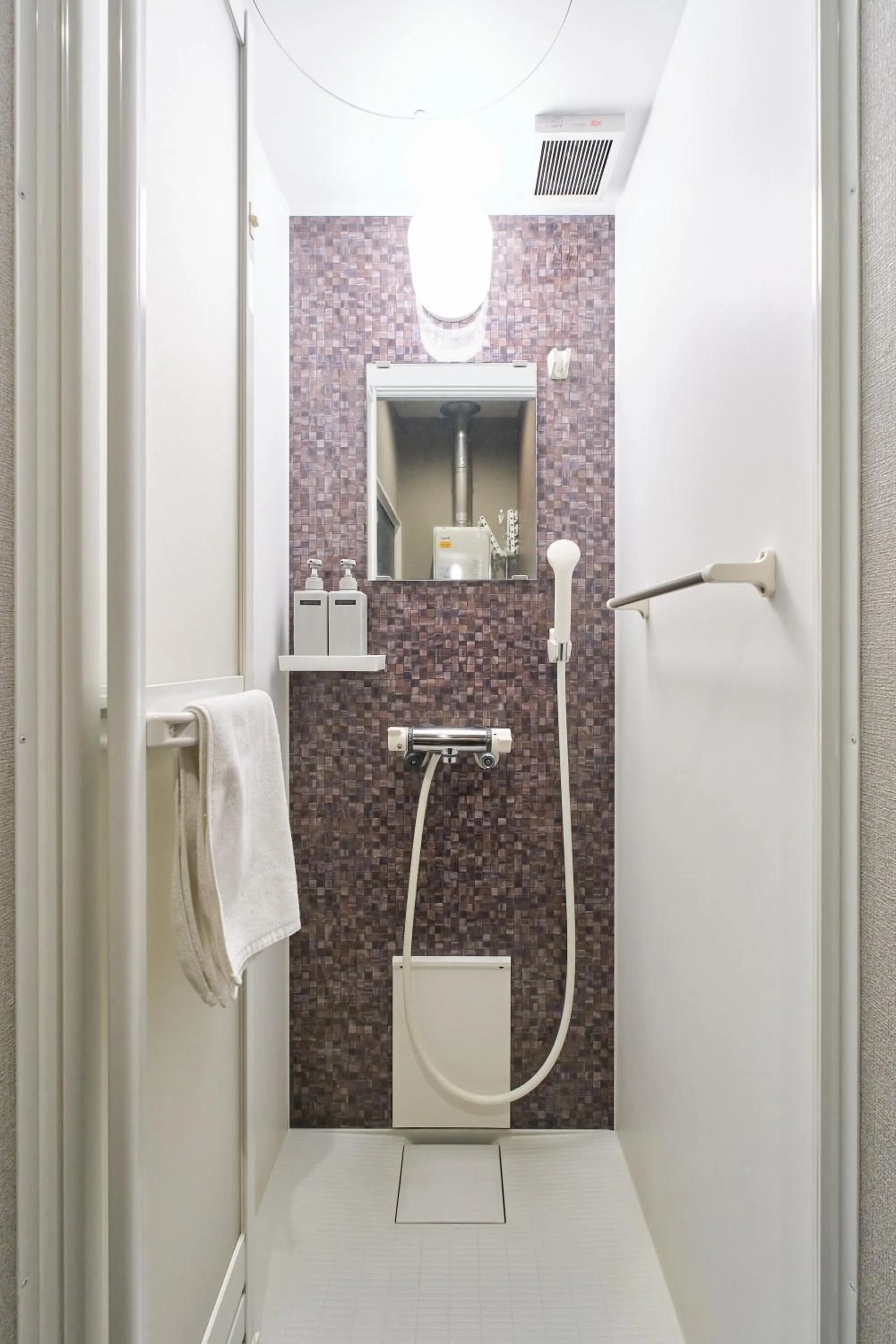 Shower in UCHI SUSUKINO WEST by Hotel Wheat