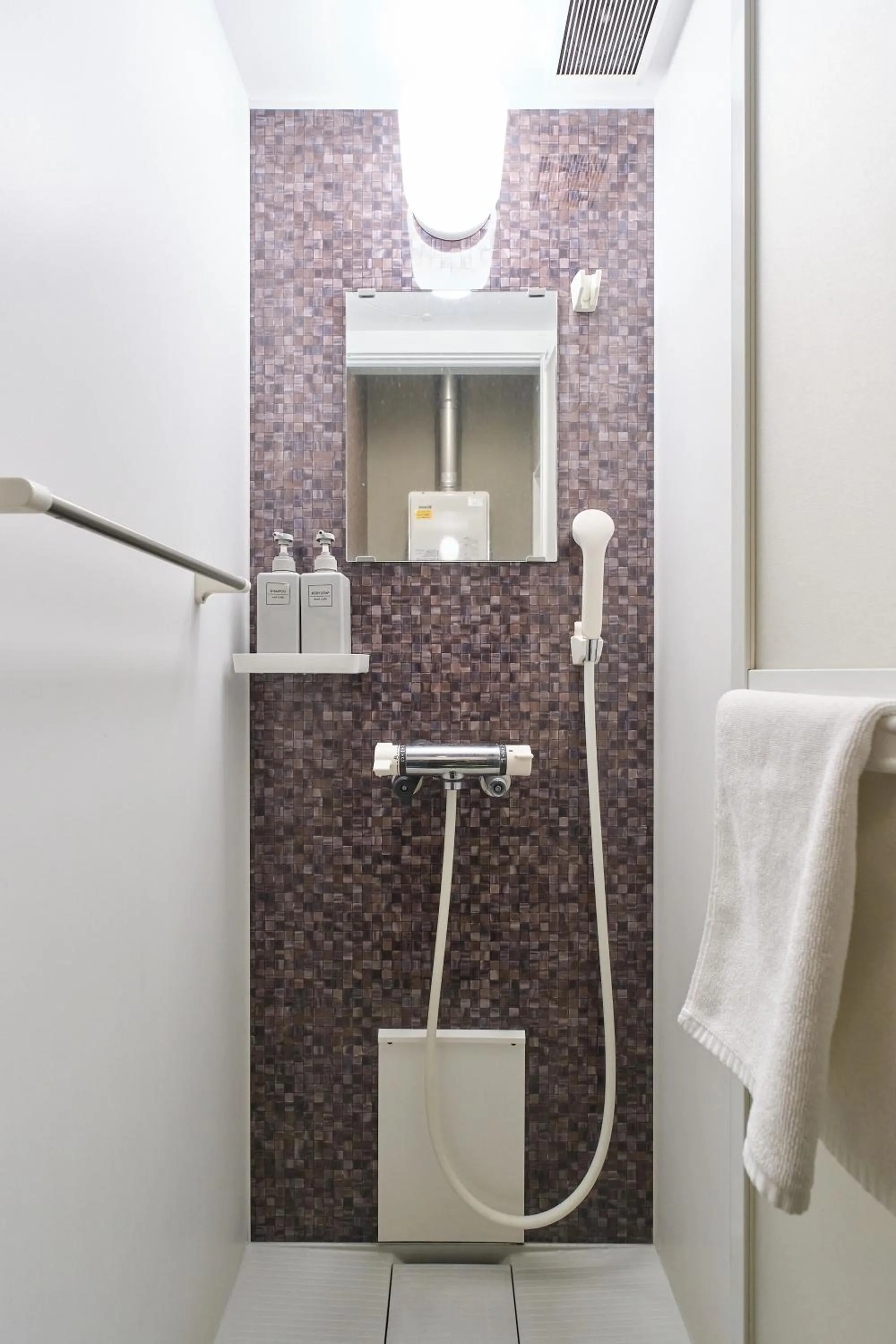 Shower in UCHI SUSUKINO WEST by Hotel Wheat