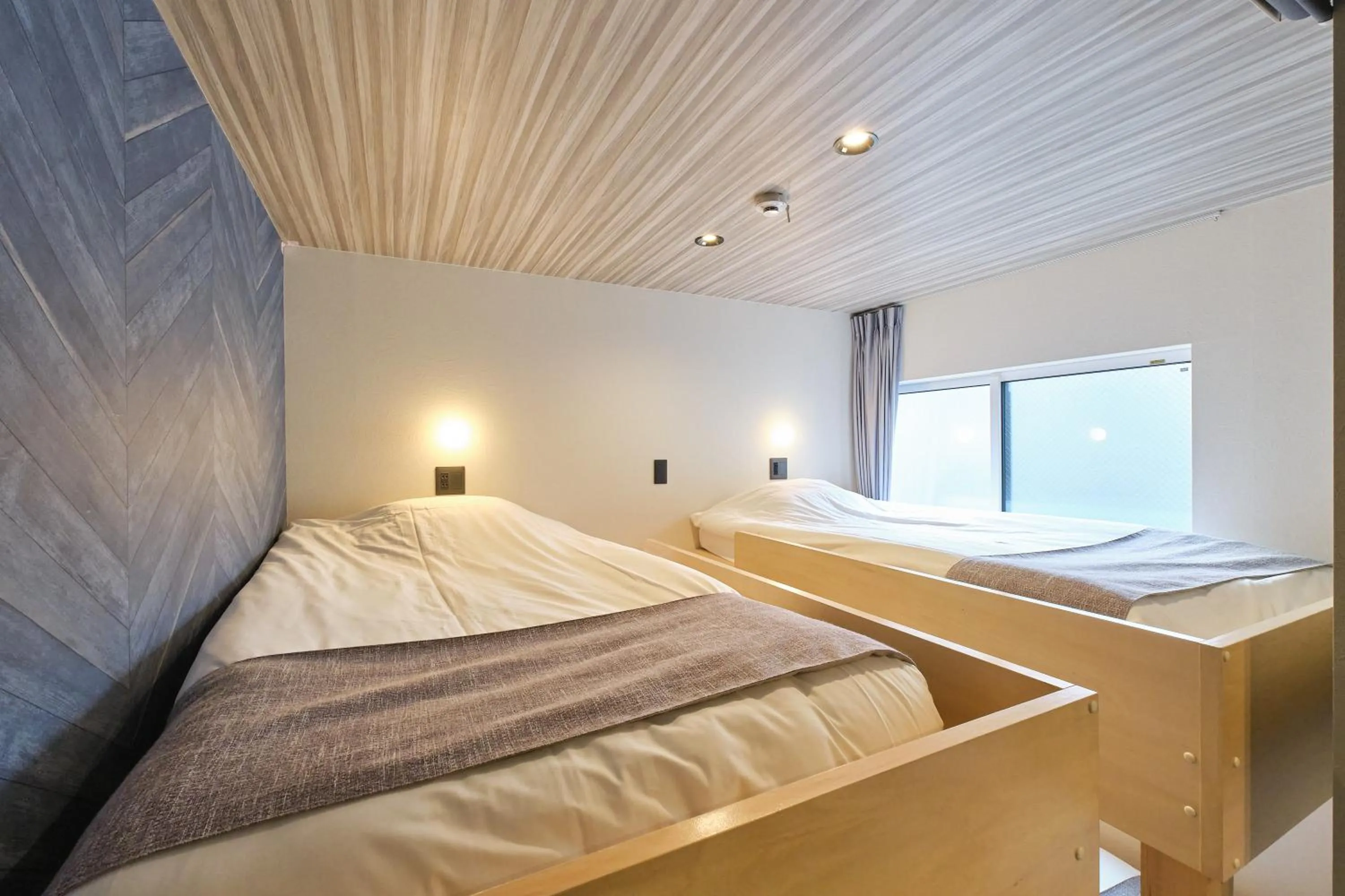 Bedroom, Bed in UCHI SUSUKINO WEST by Hotel Wheat