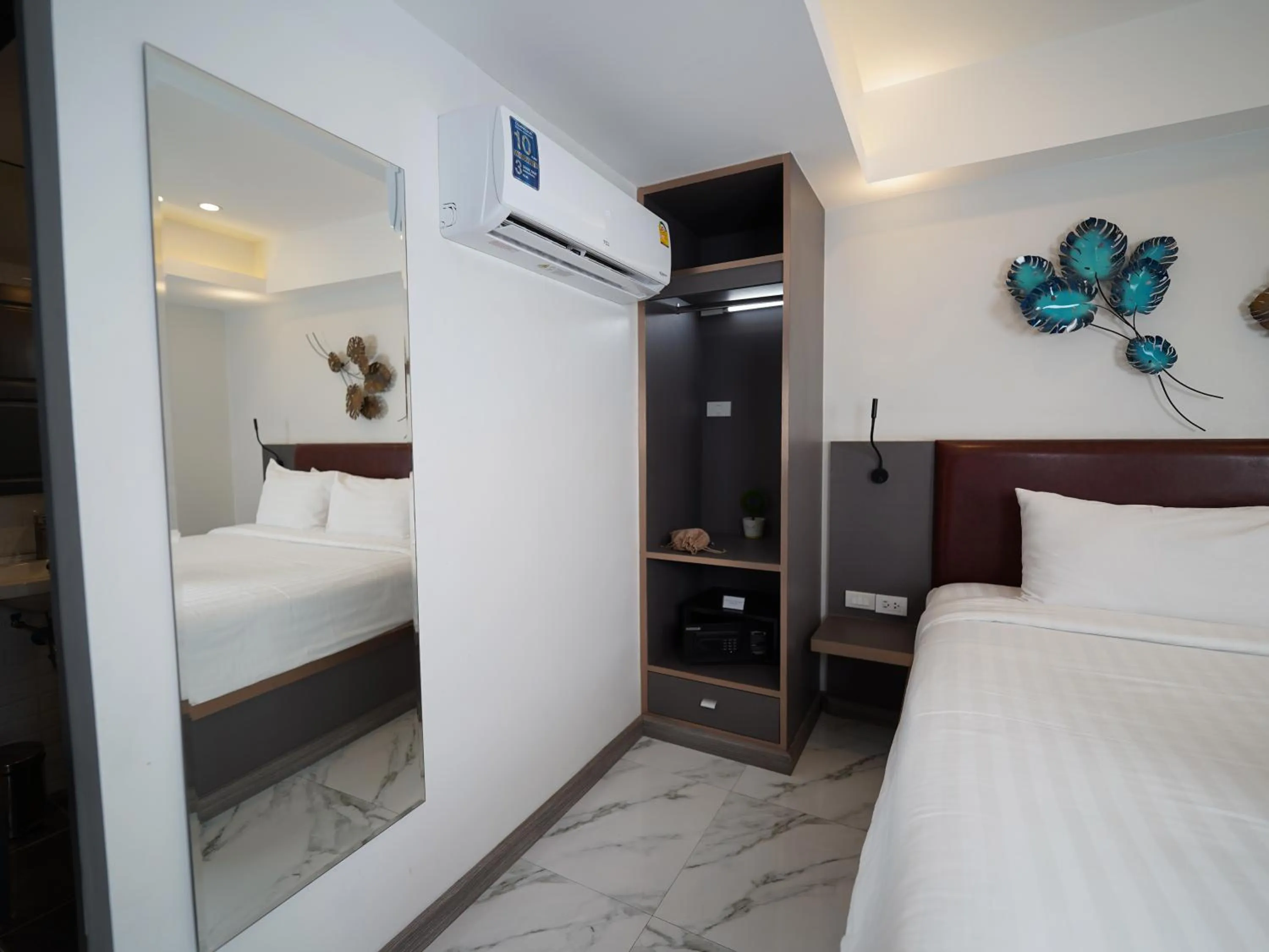 Bed in RoomQuest Sukhumvit36 BTS Thonglor