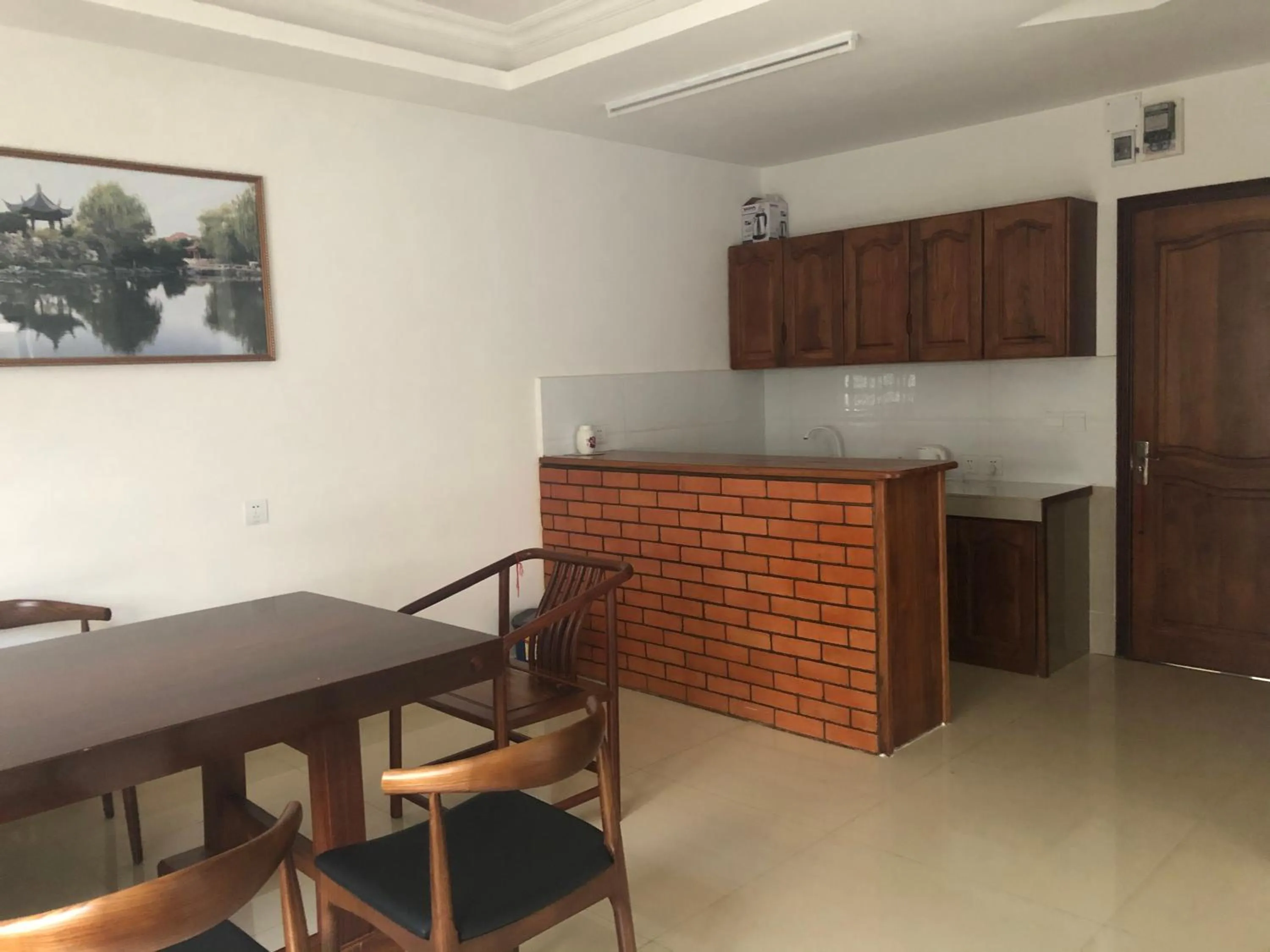 Kitchen or kitchenette in Feima Hotel