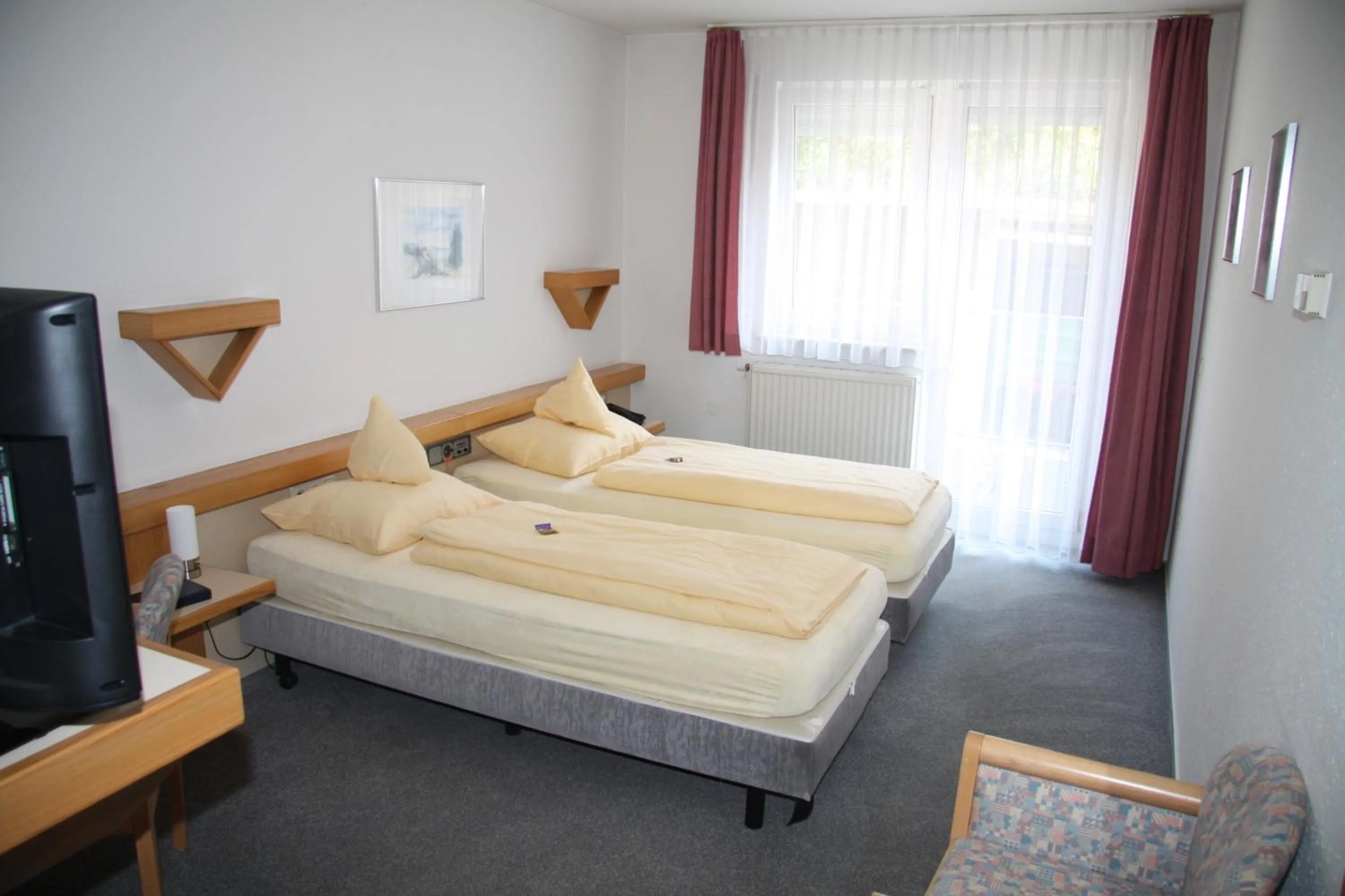 Photo of the whole room, Bed in Akzent Hotel Goldener Ochsen