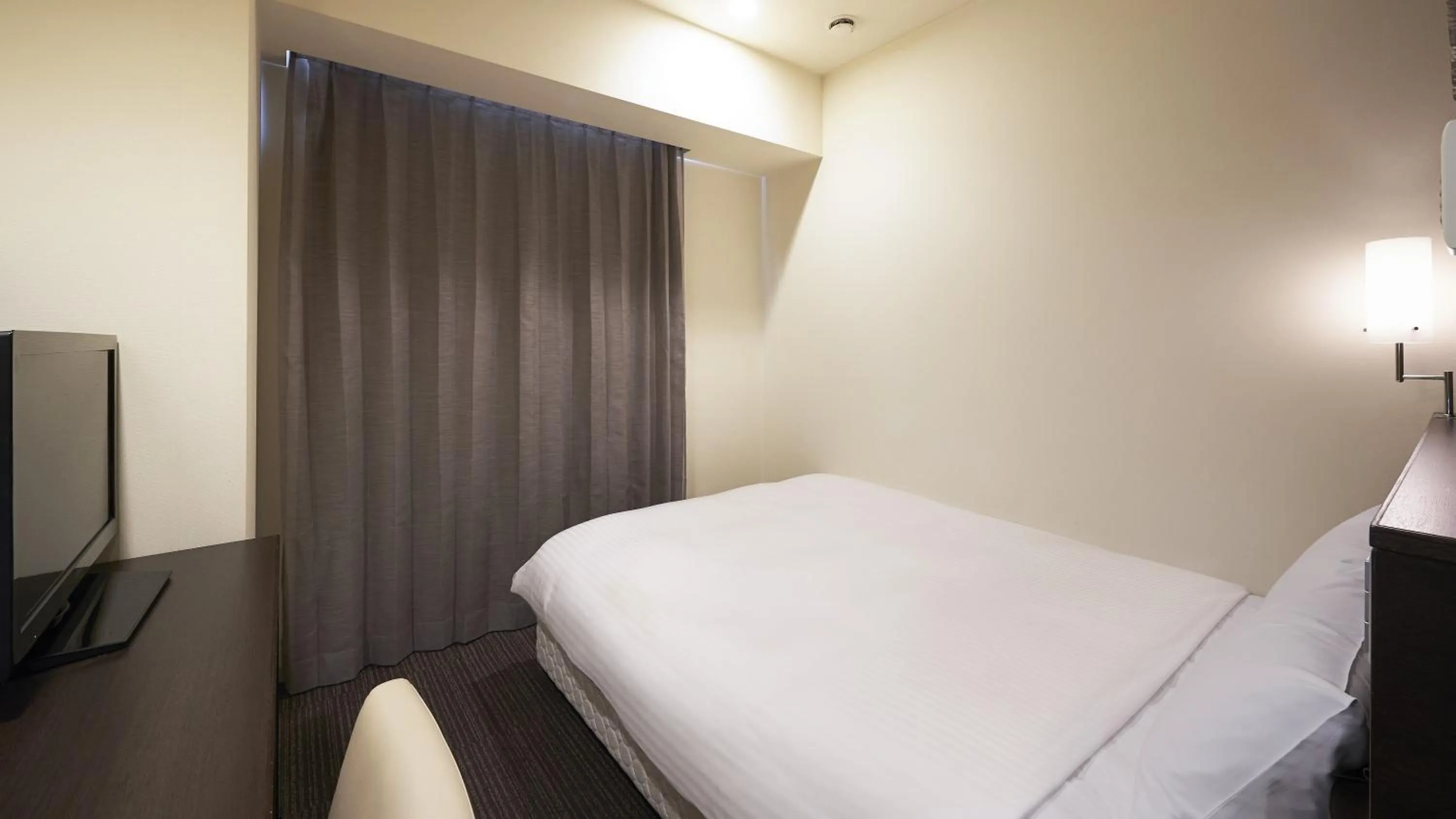 Photo of the whole room, Bed in Sotetsu Fresa Inn Chiba Kashiwa