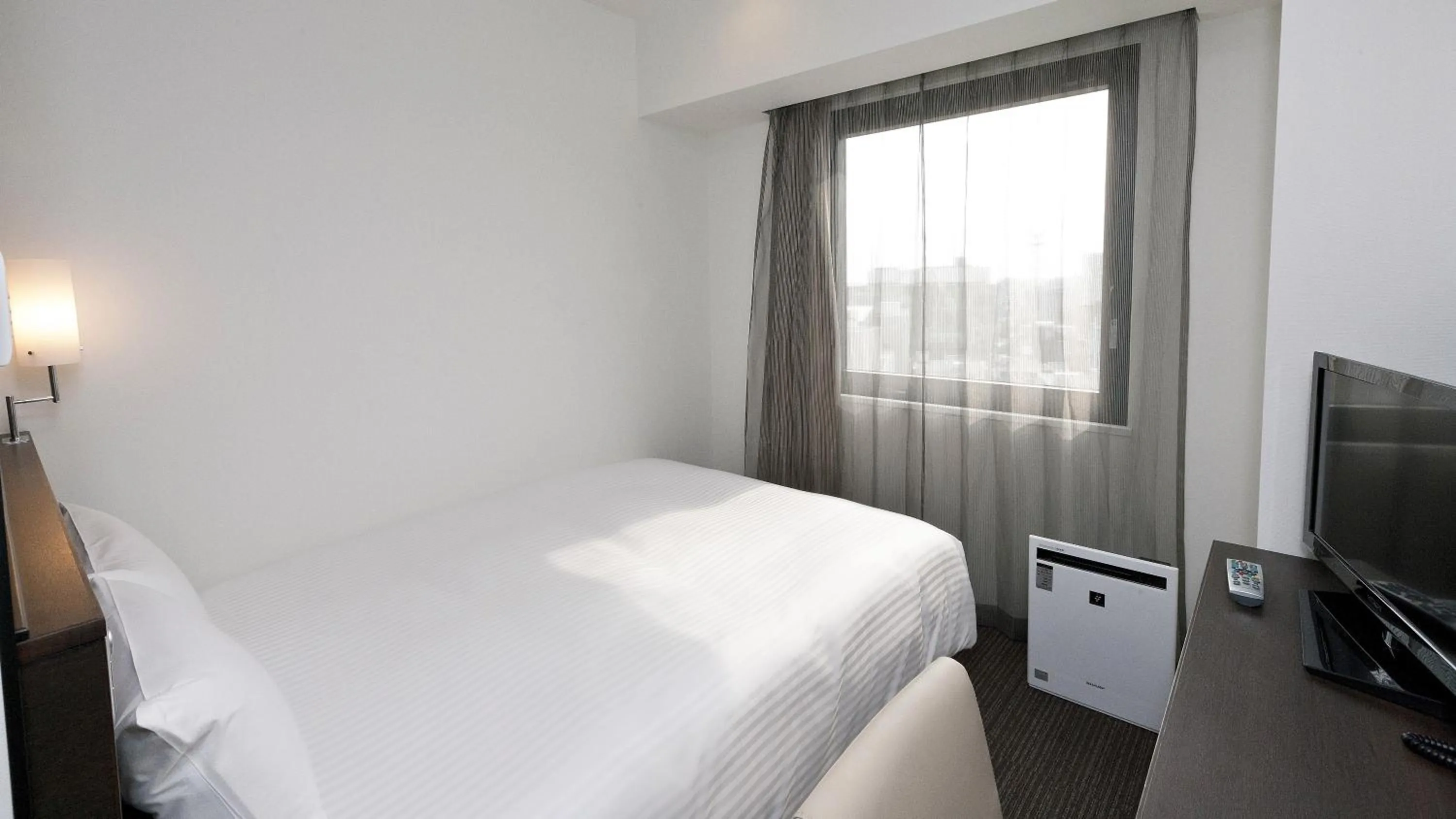 Photo of the whole room, Bed in Sotetsu Fresa Inn Chiba Kashiwa