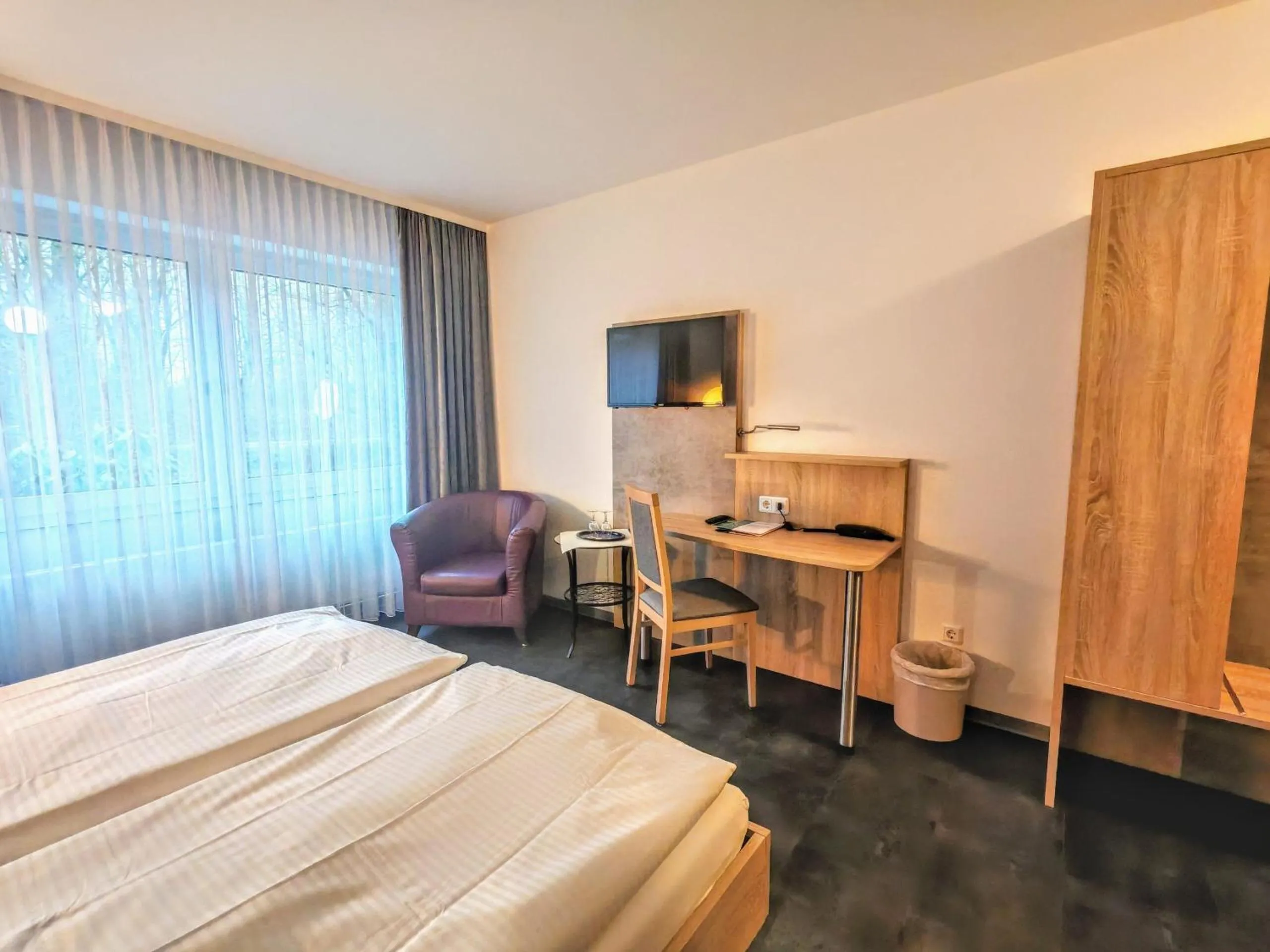 Bed in Hotel Ostfriesen Hof