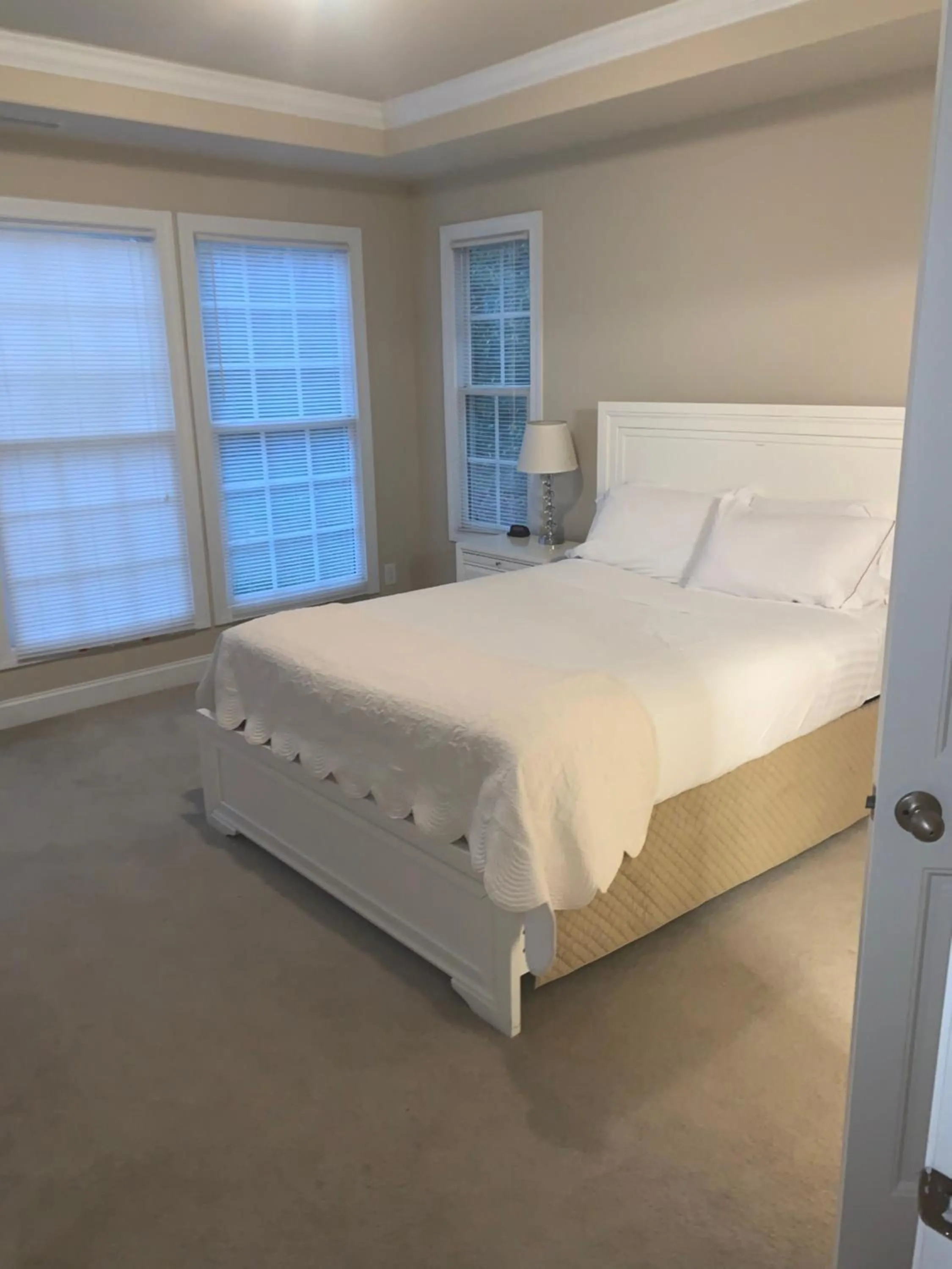 Bed in Cottages and Suites at River Landing