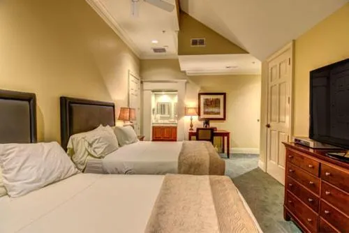 Bed in Cottages and Suites at River Landing