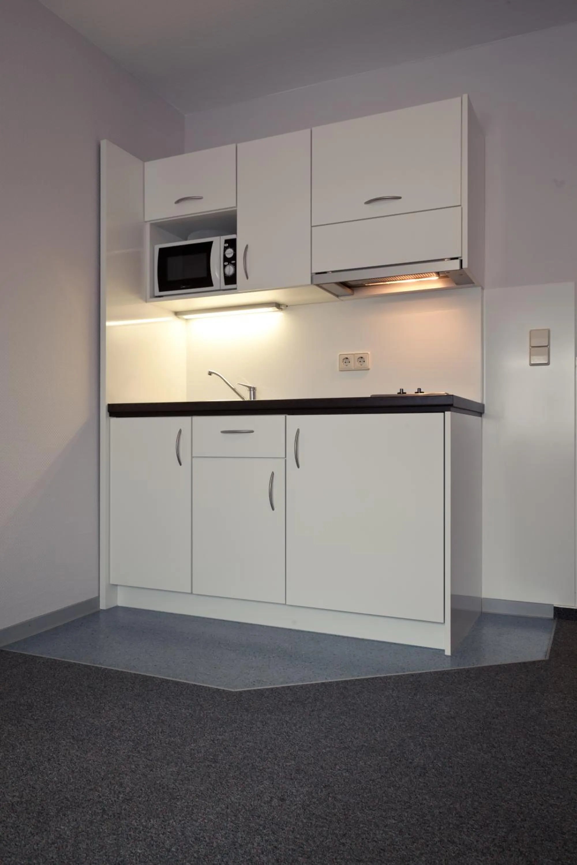 Kitchen or kitchenette in Akzent Hotel Torgauer Hof